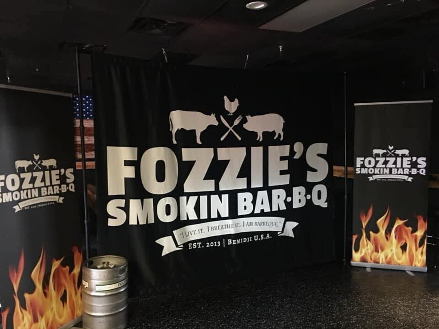 Fozzie's Smokin Bar-B-Q banners and signage displayed for a Bemidji BBQ catering event.