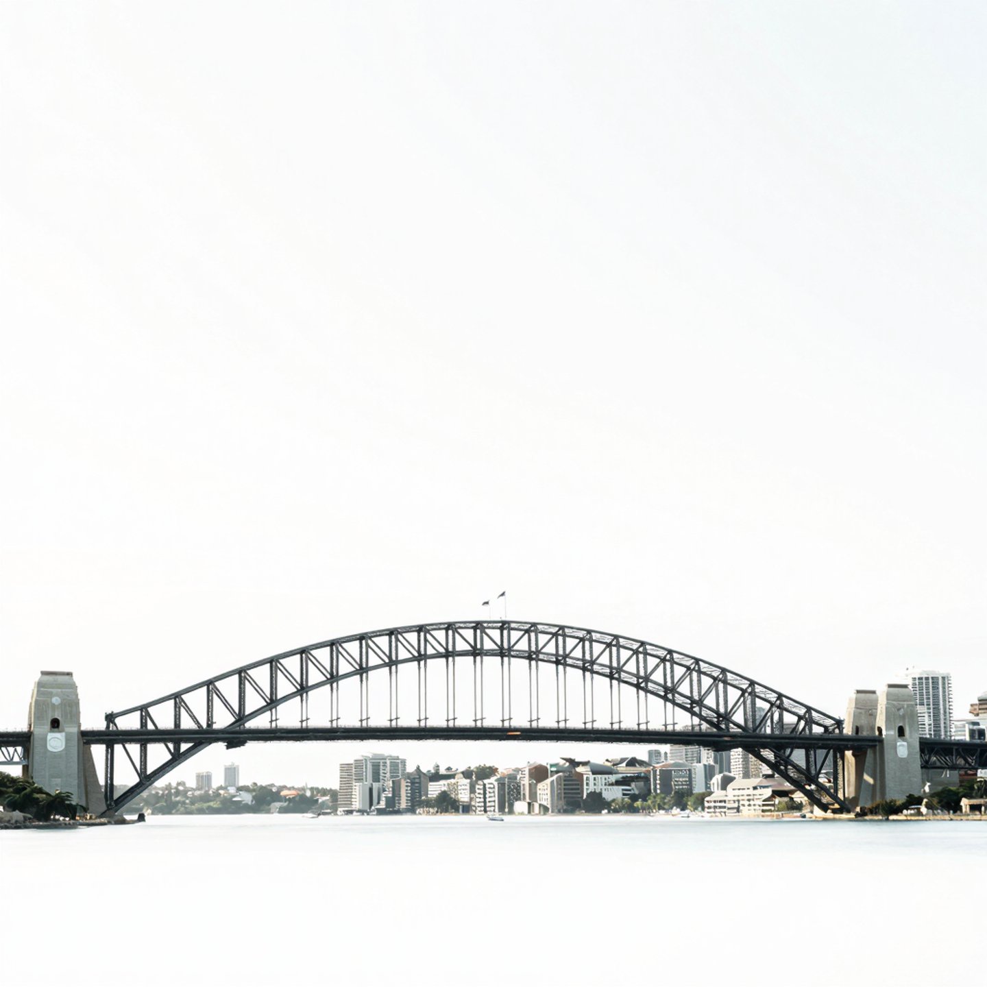 Minimalist architectural photography of Sydney harbor bridge and skyline in bright natural daylight, clean white and subtle green tones, high-end editorial