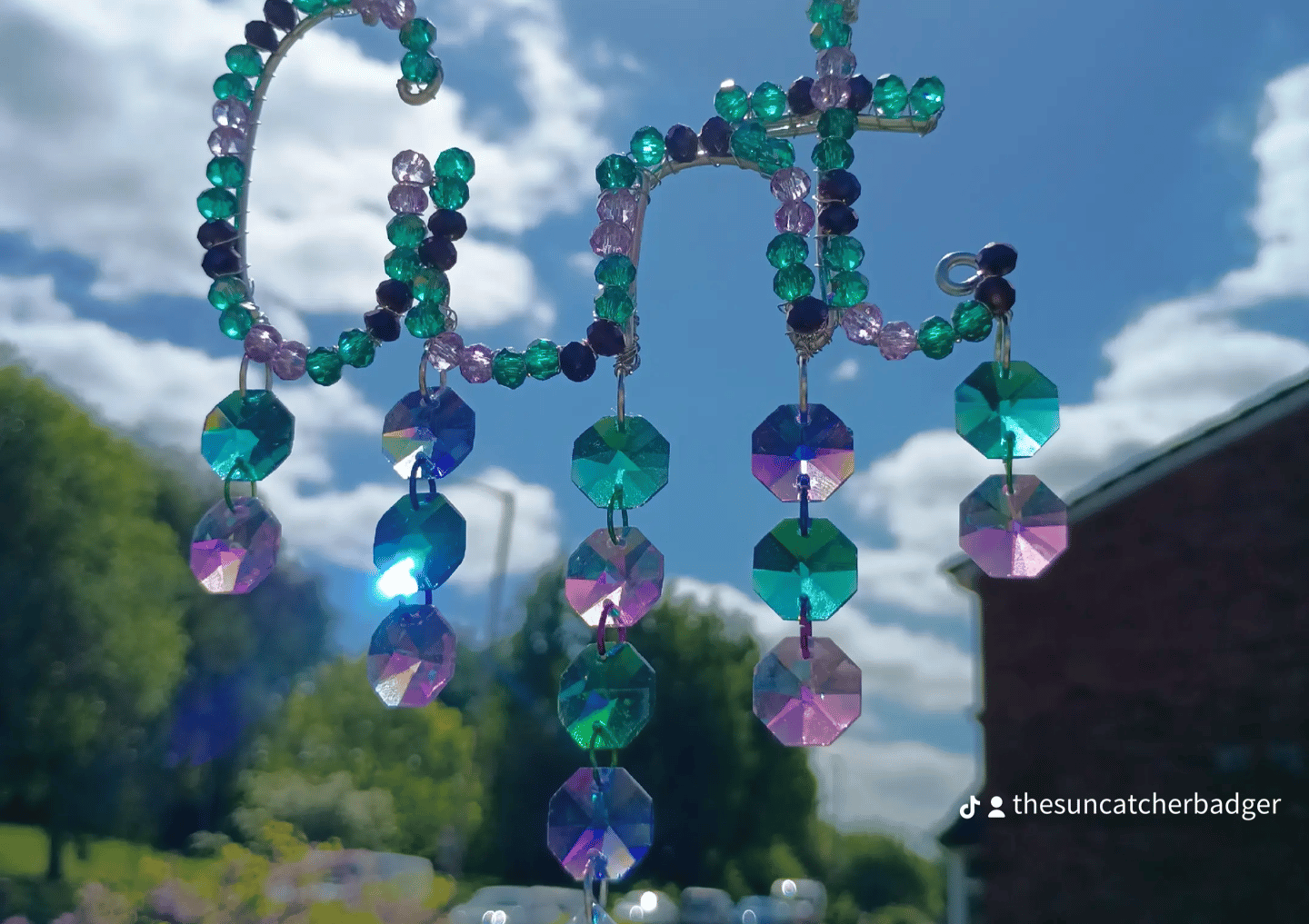 A deep ocean inspired cunt suncatcher called The Sea Witch