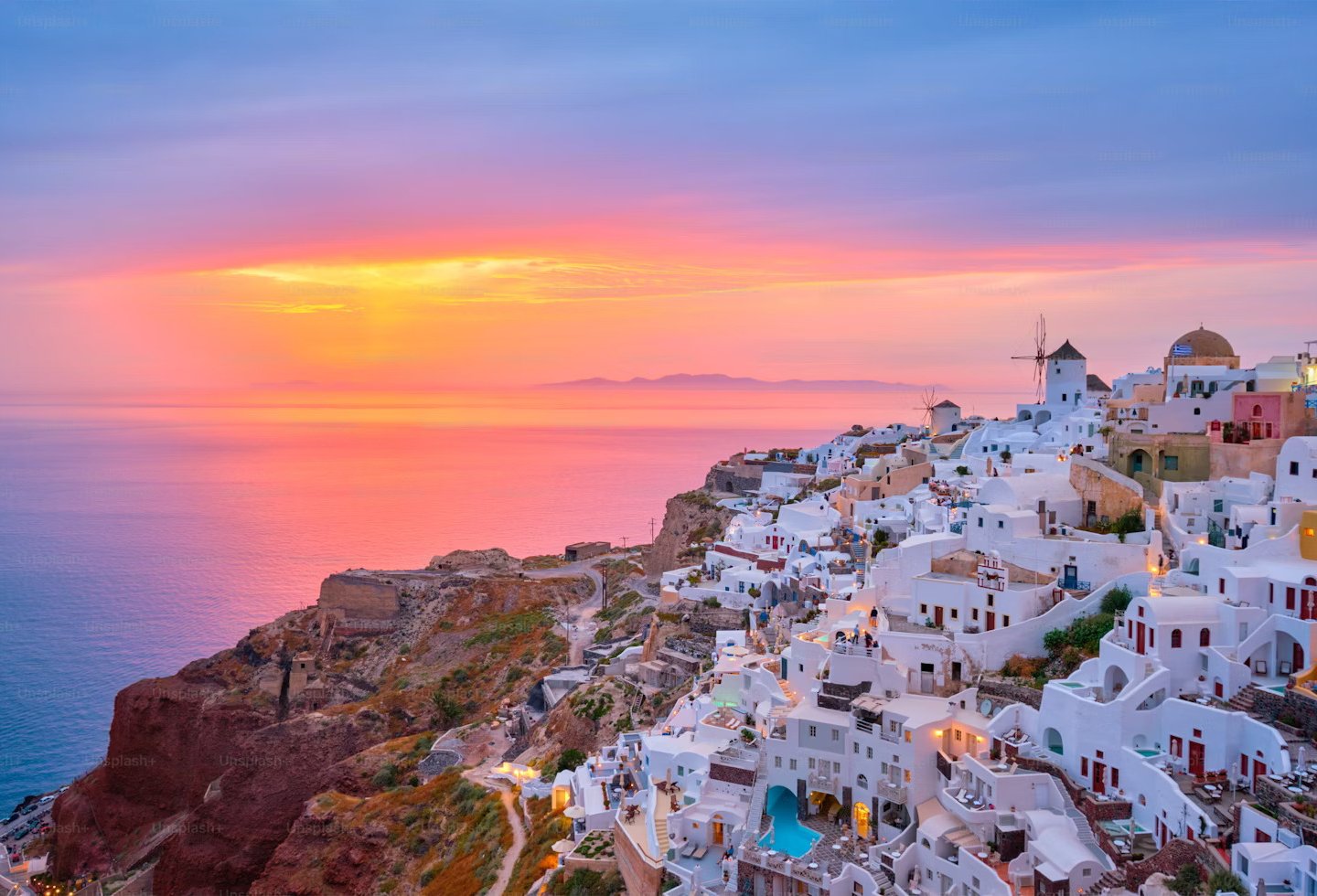 a sunset view of a beautiful sunset over the ocean