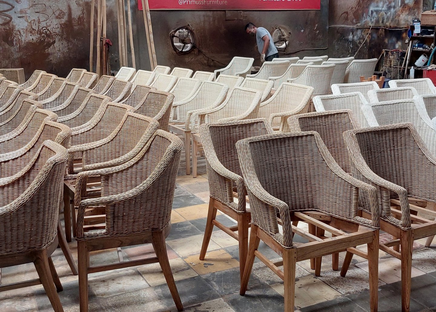 Rattan chair made by Primuss Furniture in finishing process ordered by a hotel in Barcelona, Spain