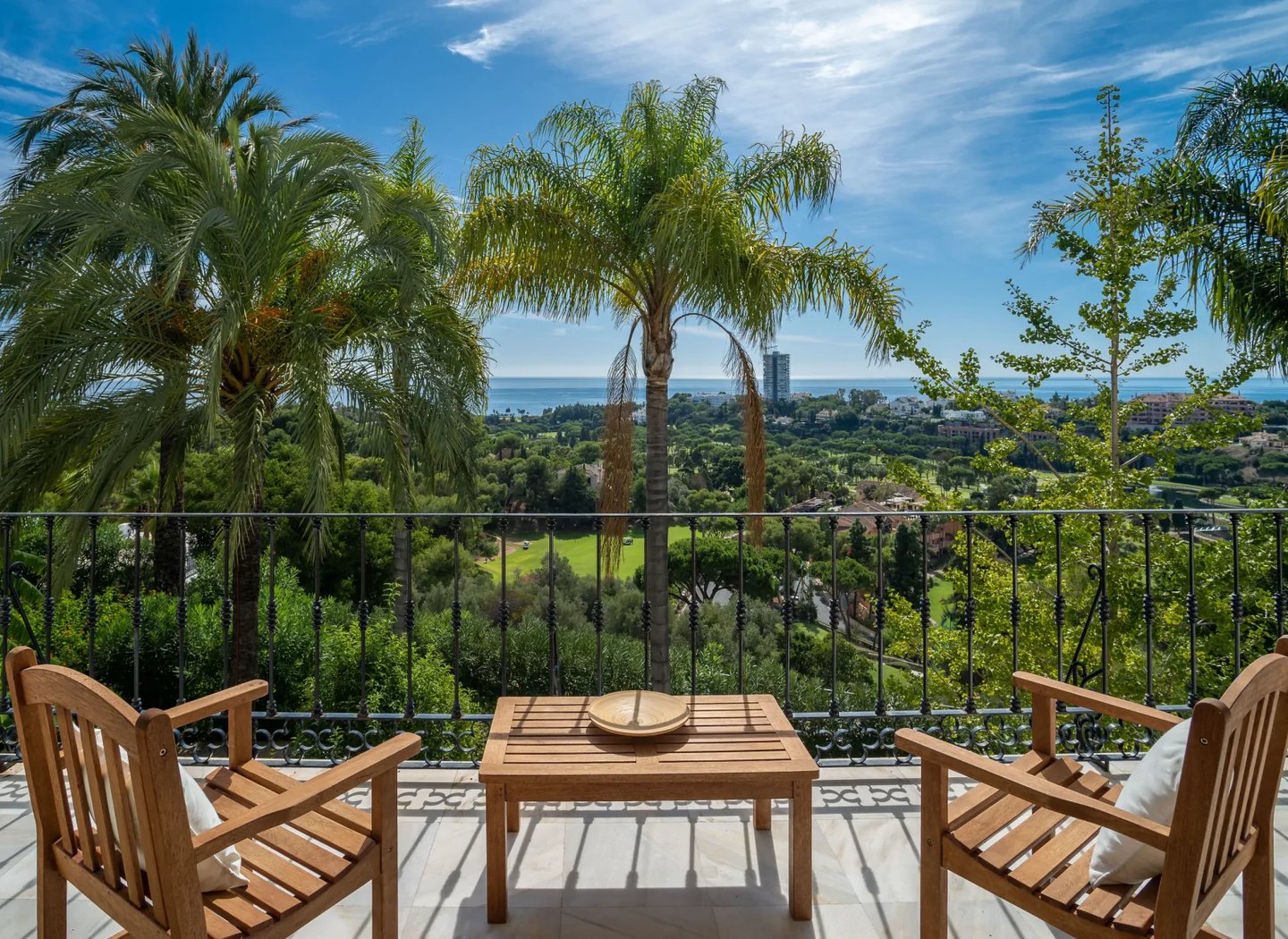 Golf and Mediterranean views from villa terrace
