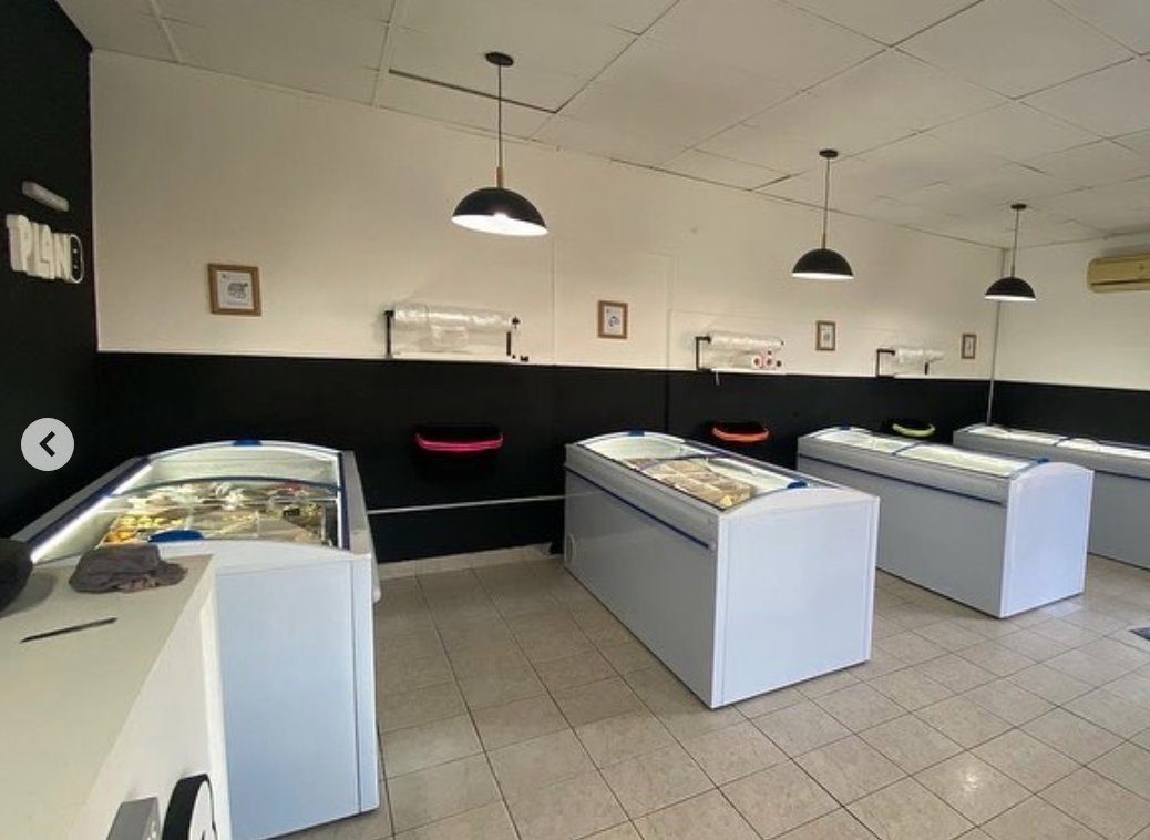 a display case with a variety of different types of food