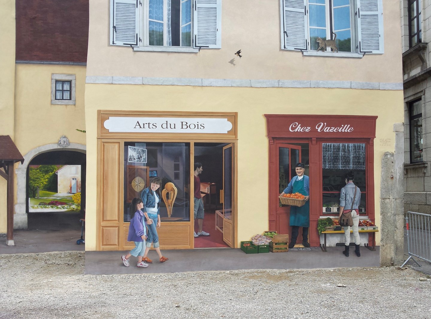 Des devantures et fenêtres en trompe-l'oeil sur façades à Moirans-en-Montagne
