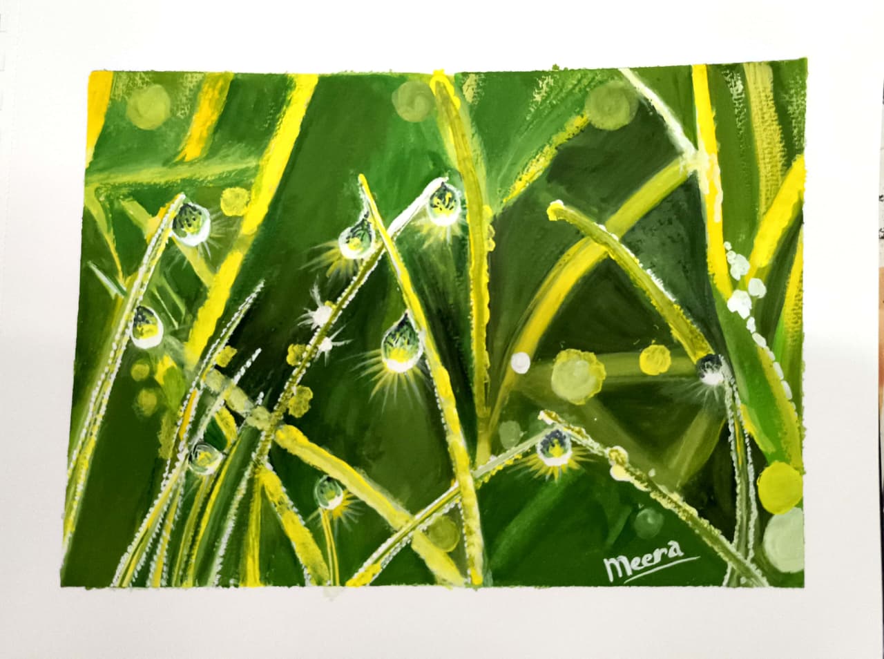 Glistening droplets of morning dew cling onto bright, sun-kissed blades of emerald and golden grass,