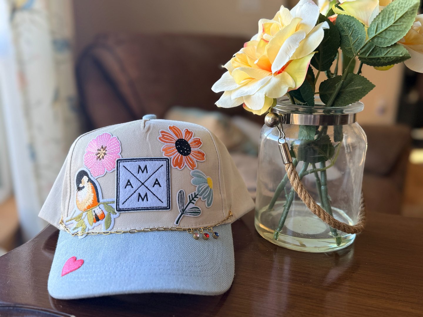 mama hat with flowers and bird