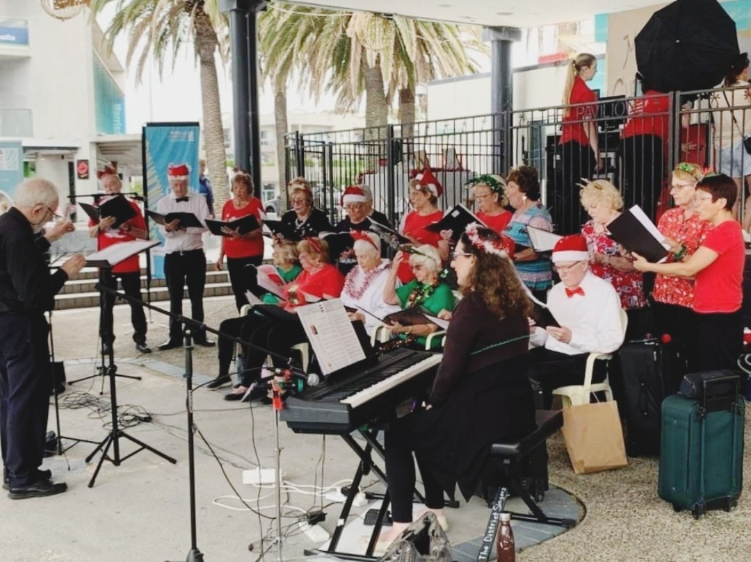 The District Singers perform at Cronulla Mall