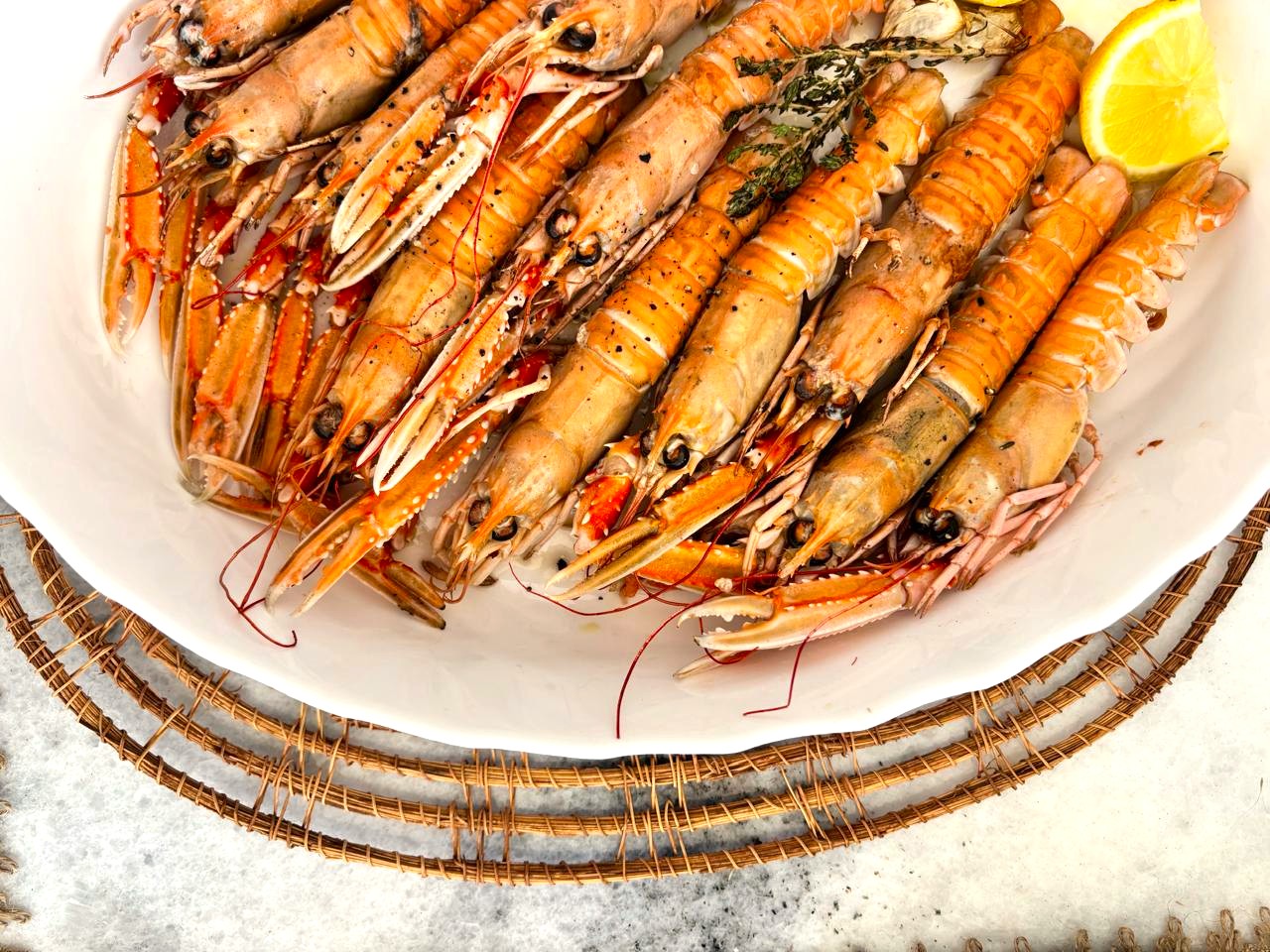 Grilled fresh langoustines prepared by villa eats private chefs Naxos served at a villa in Naxos