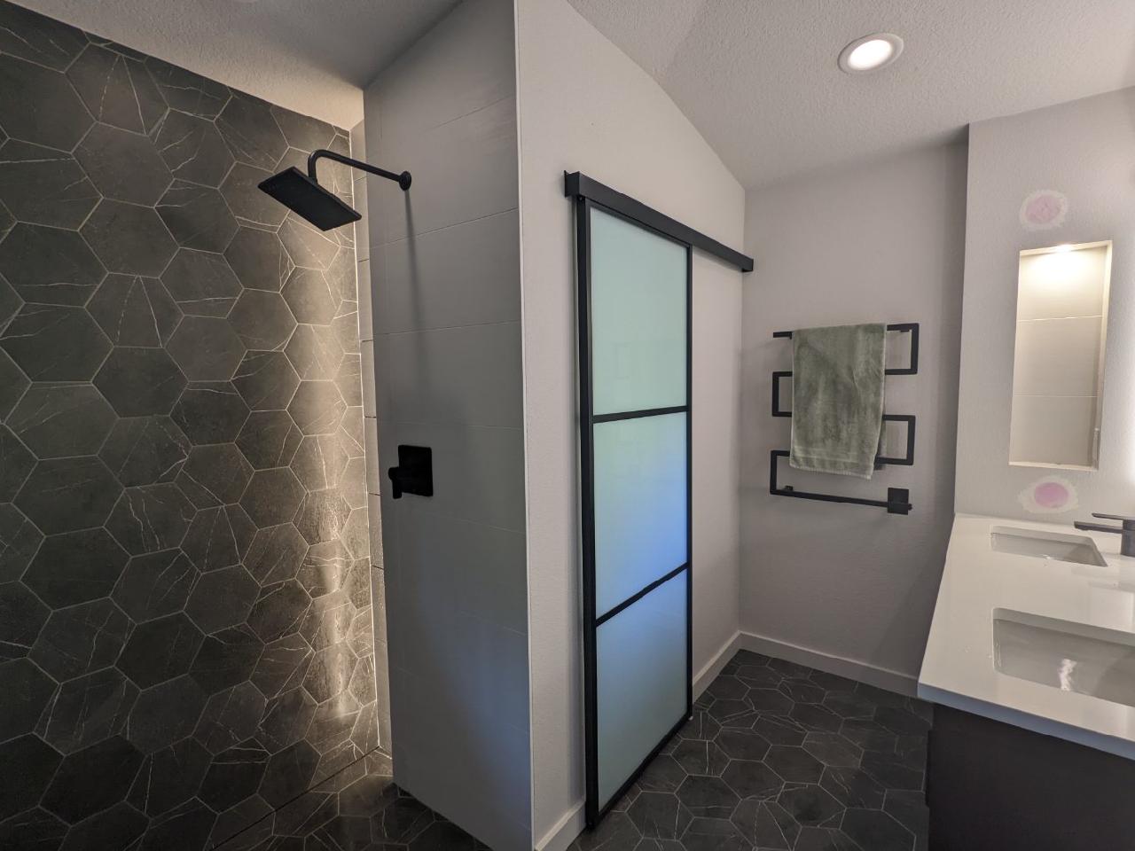 Luxurious modern bathroom with walk in shower