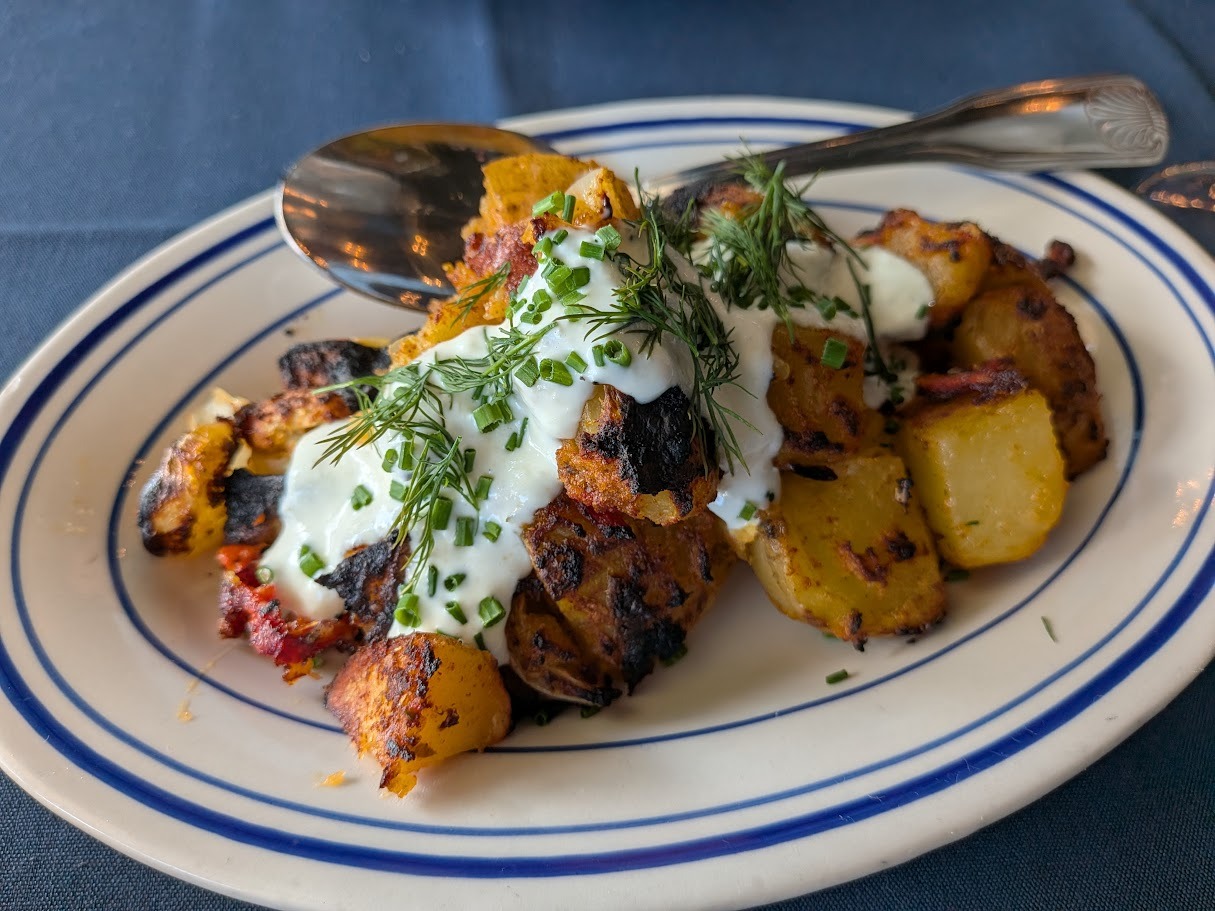 potatoes topped with sauce