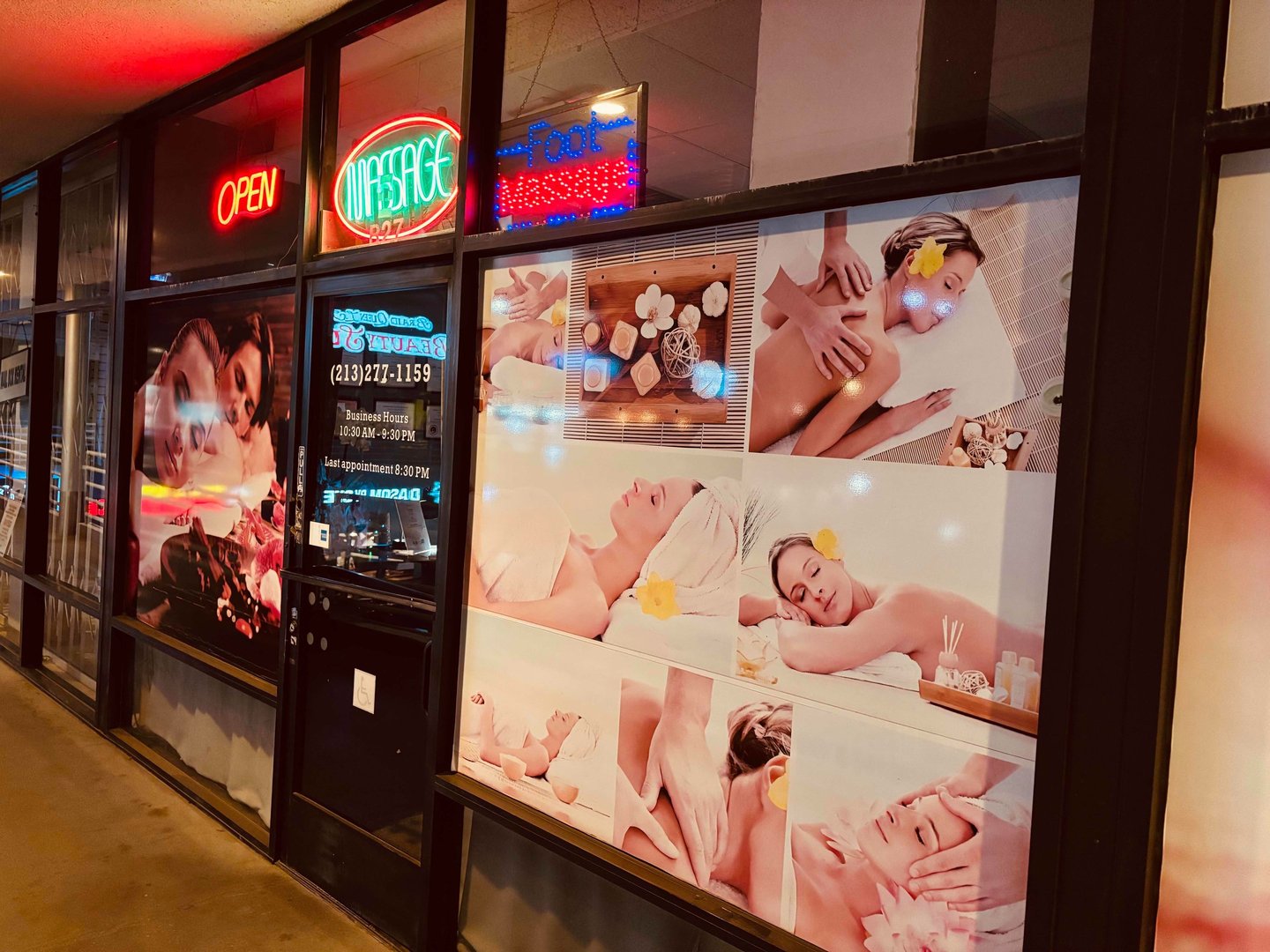 a storefront door with a large display of baby's