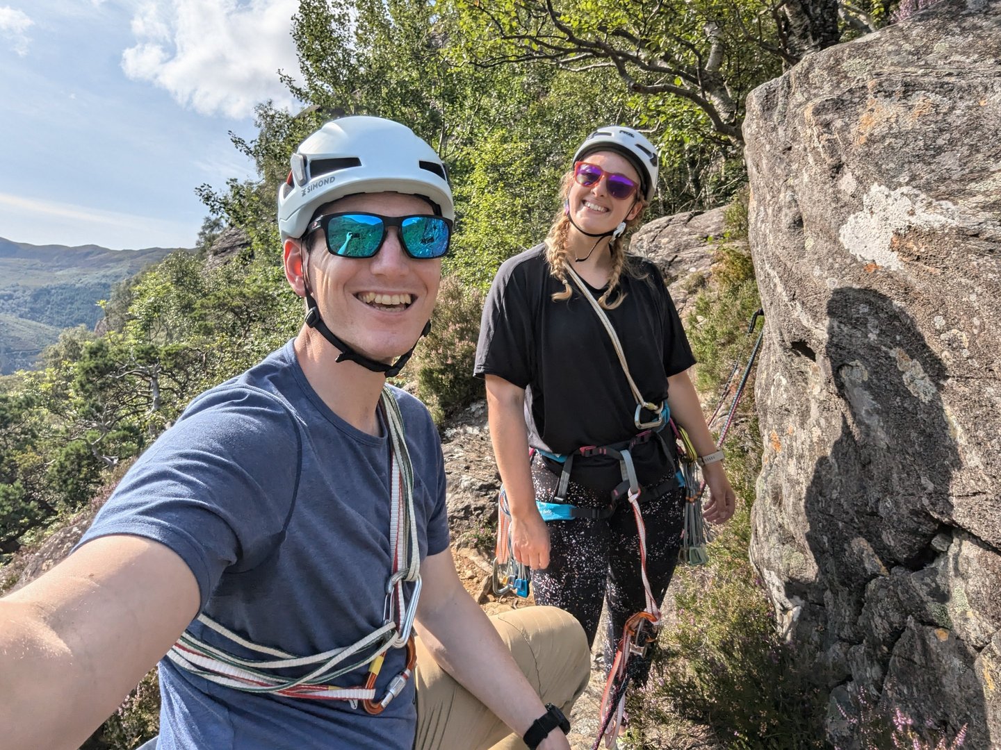 couple rock climbing