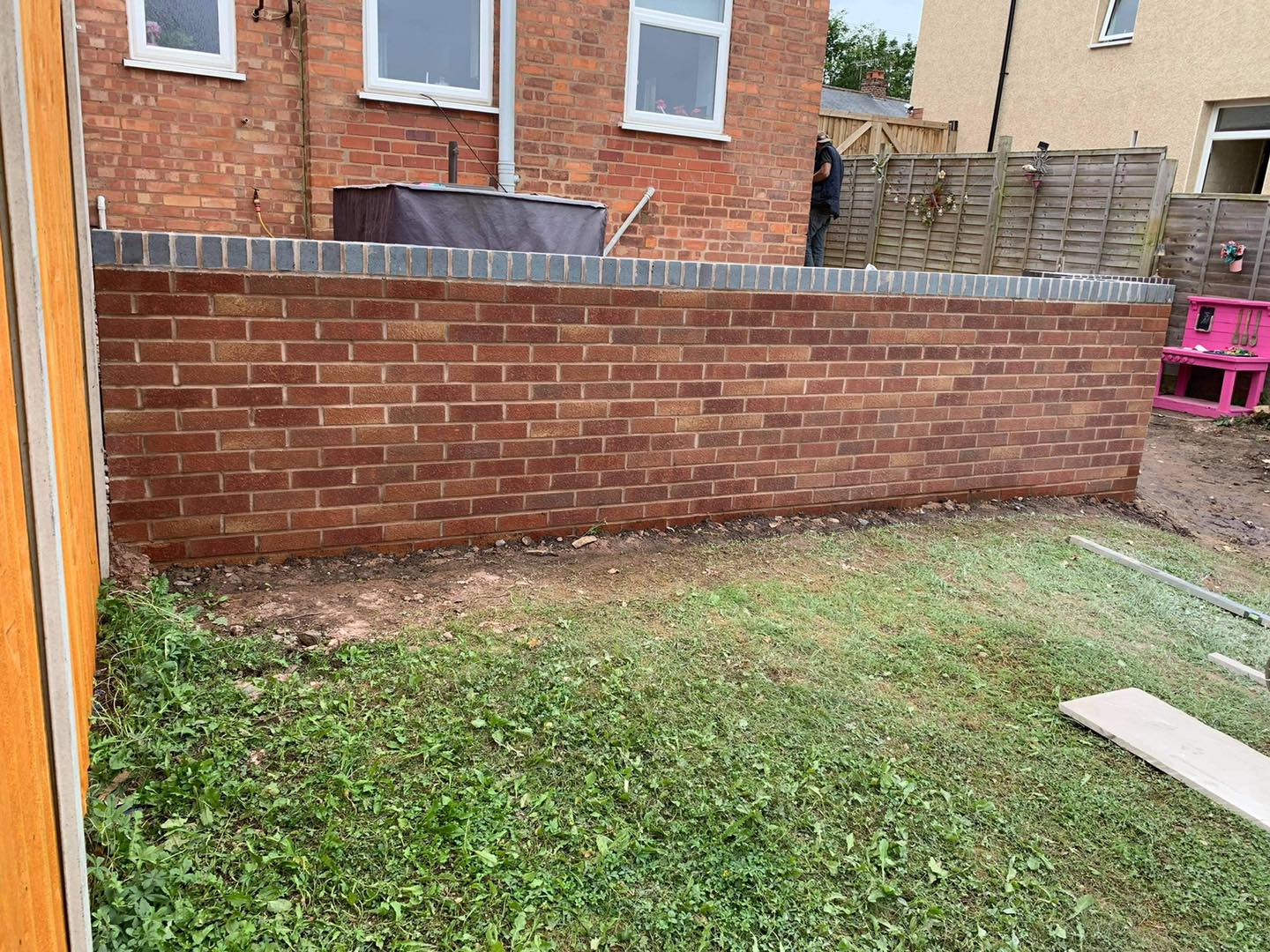 Solid brick boundary wall in Worcester residential property