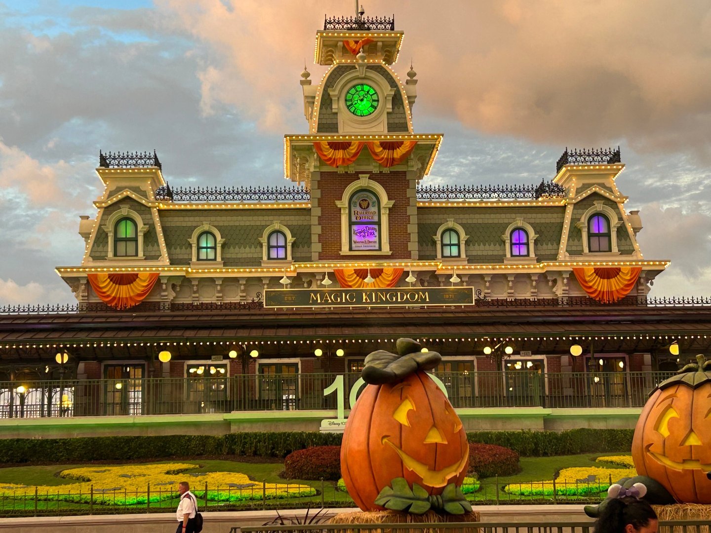 Magic Kingdom Train Station, decked with orange banners for Mickey's Not-So-Scary Halloween Party.