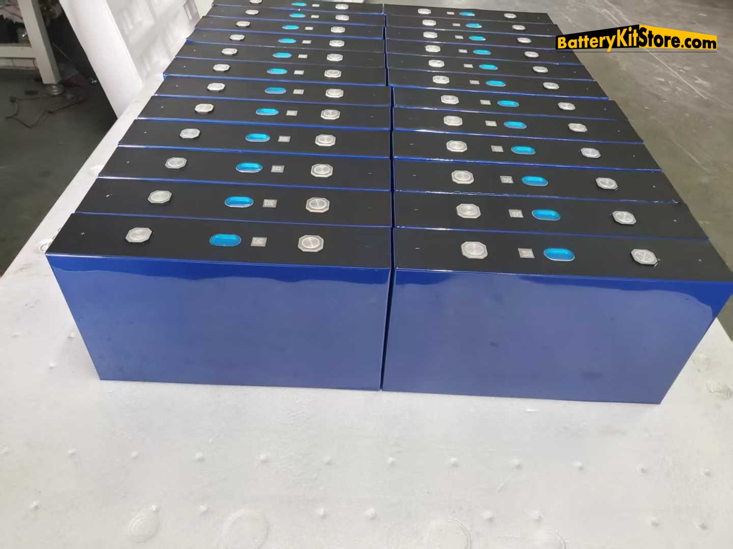 EVE prismatic lithium cells racked up on a pallet