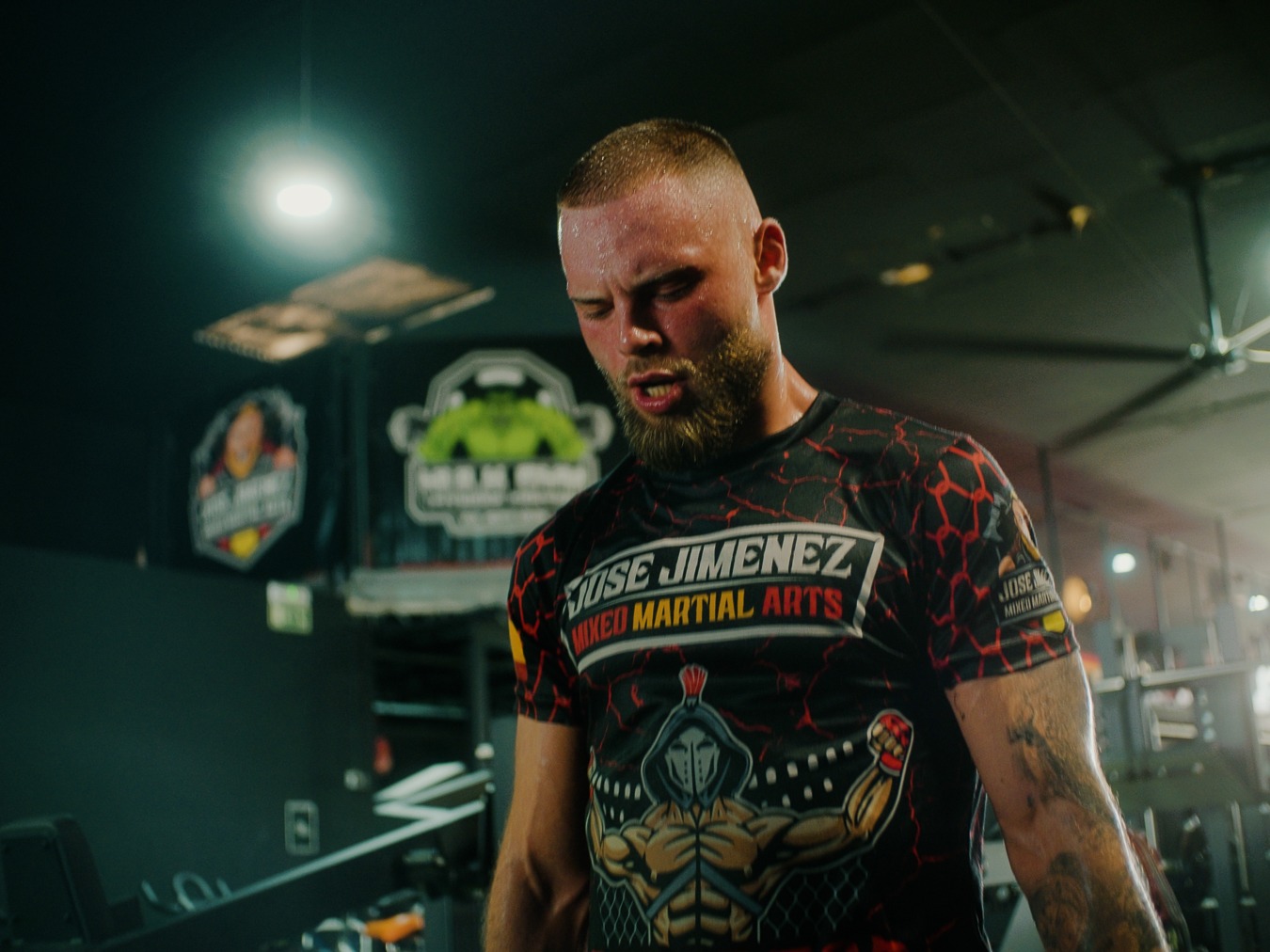 a man with a beard and a beard, wearing a black shirt