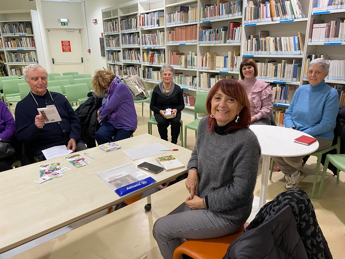 a group of people sitting around a table