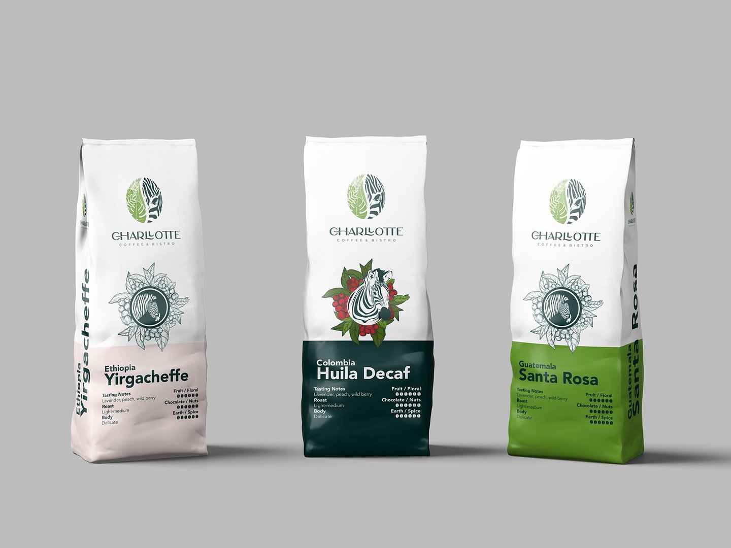three bags of coffee beans and a bag of coffee