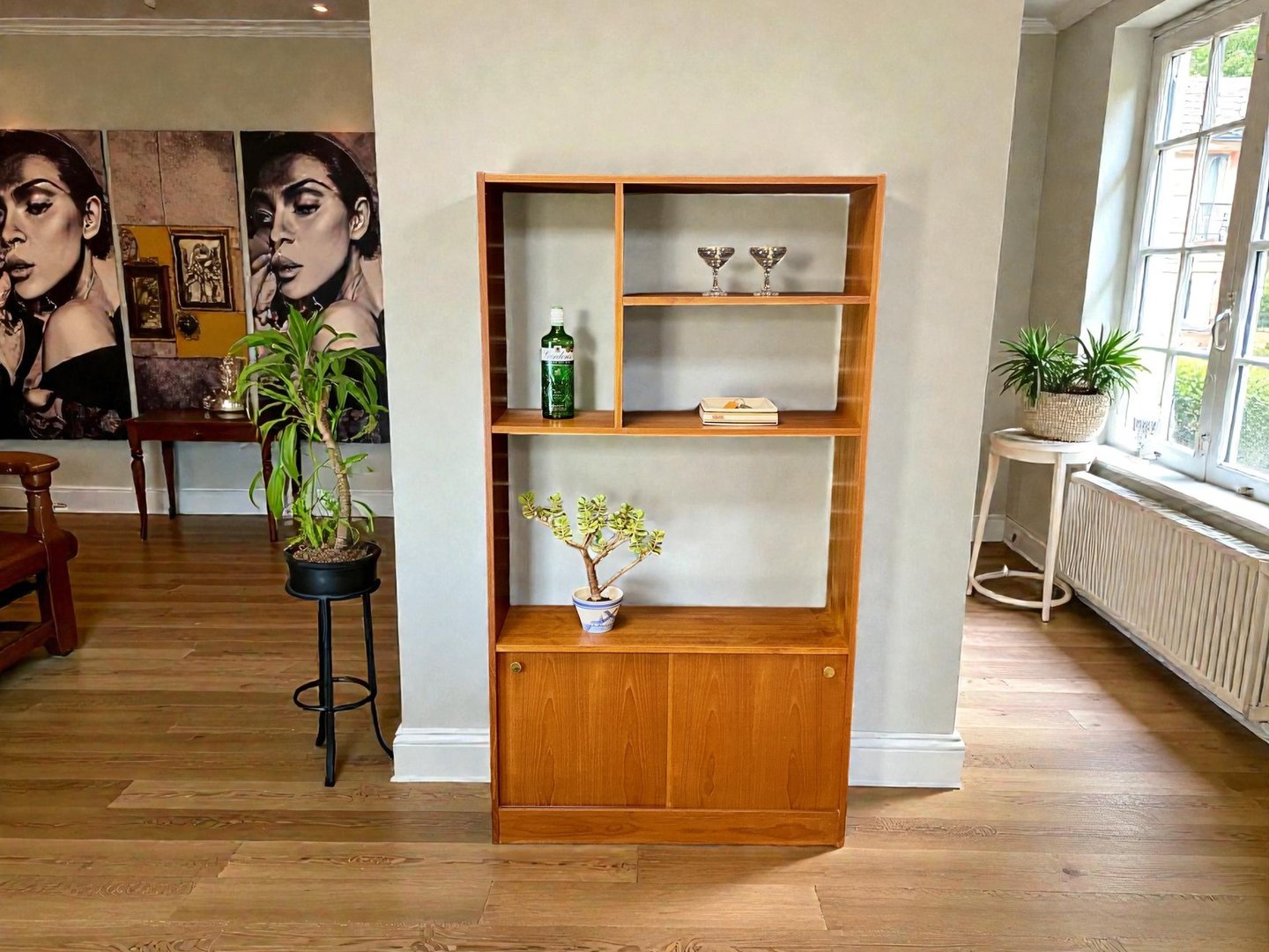 Mid Century room divider shelving unit in teak with retro vintage design and open practical storage display.