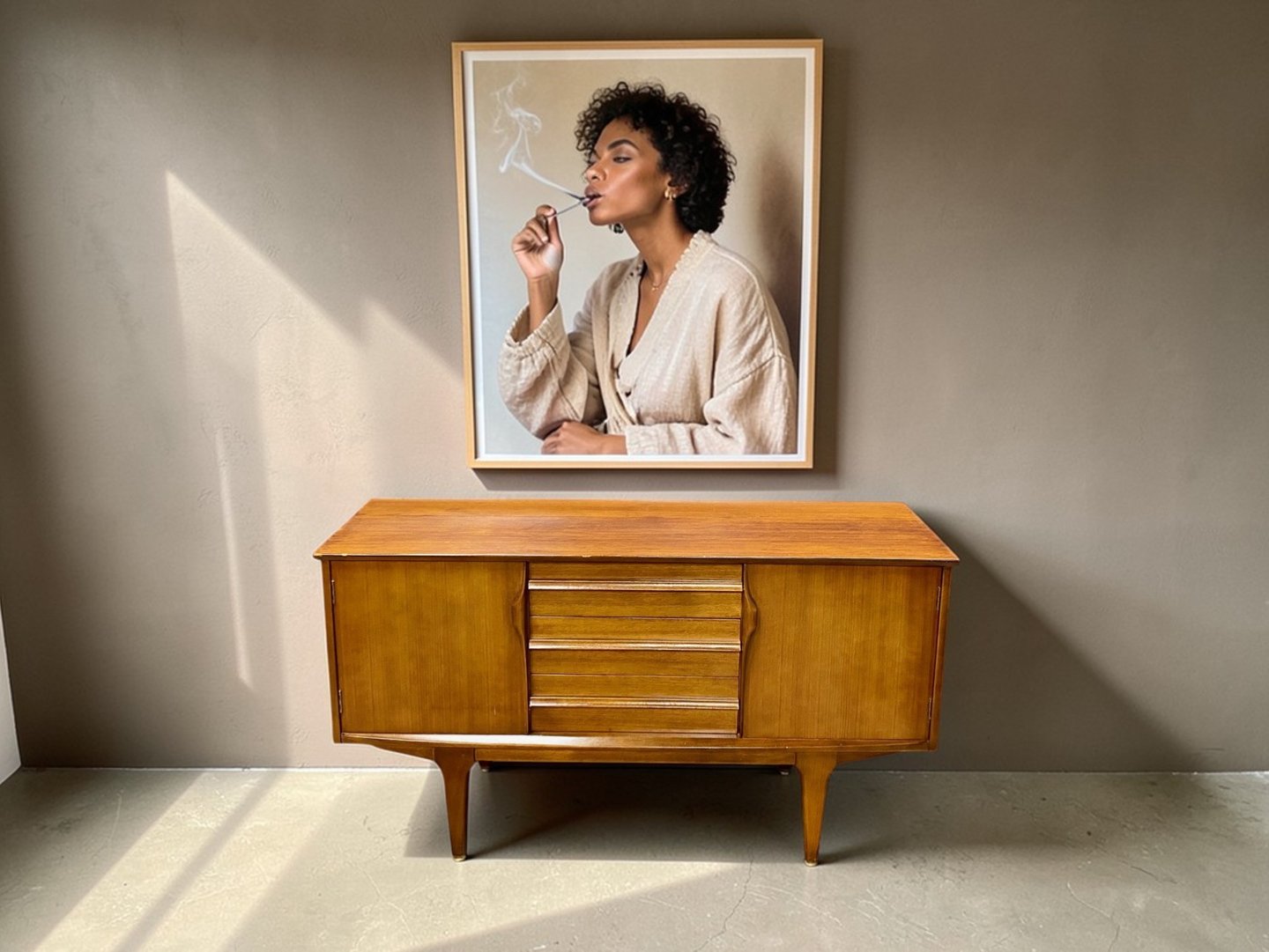 Jentique teak sideboard with Mid Century Modern design, practical storage, and timeless vintage retro style.