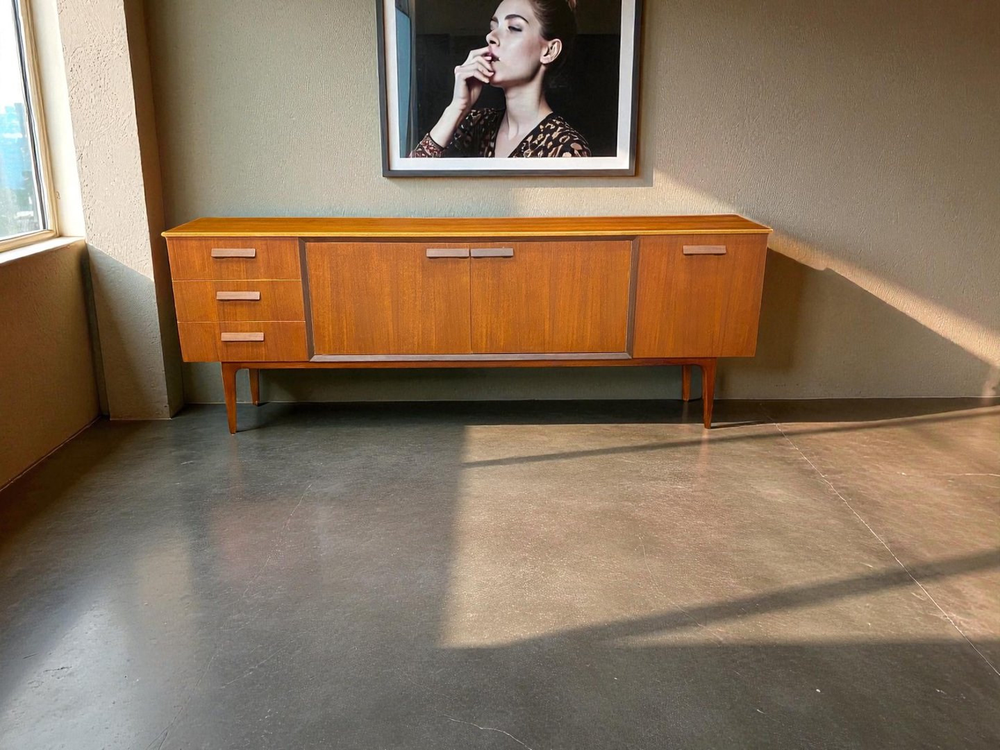 Scandinavian Danish design sideboard with clean lines, showcasing timeless Mid-Century Modern craftsmanship.