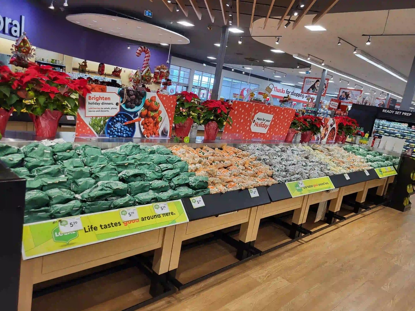 poplar bluff organics and carrots by cam display in local grocery store calgary