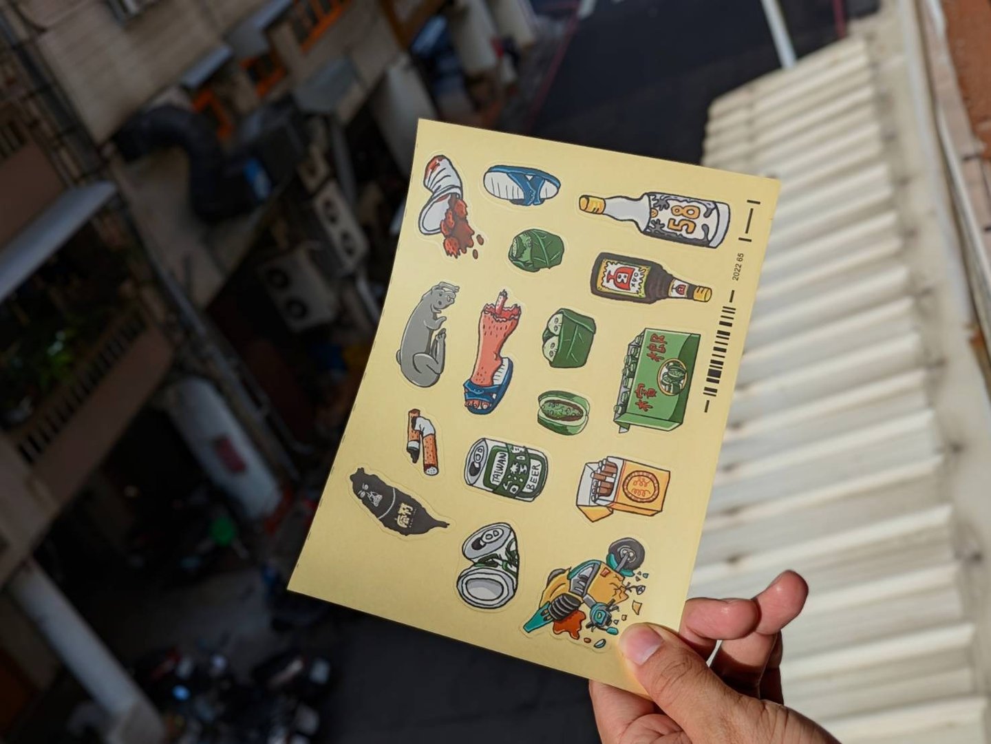 帶有台灣檳榔文化的貼紙系列，包含檳榔盒、檳榔、檳榔渣、高粱酒、保力達B、長壽菸、斷腳的流浪狗、空啤酒罐、藍白拖、撞壞的機車、煙蒂、滿口濱榔的台灣。