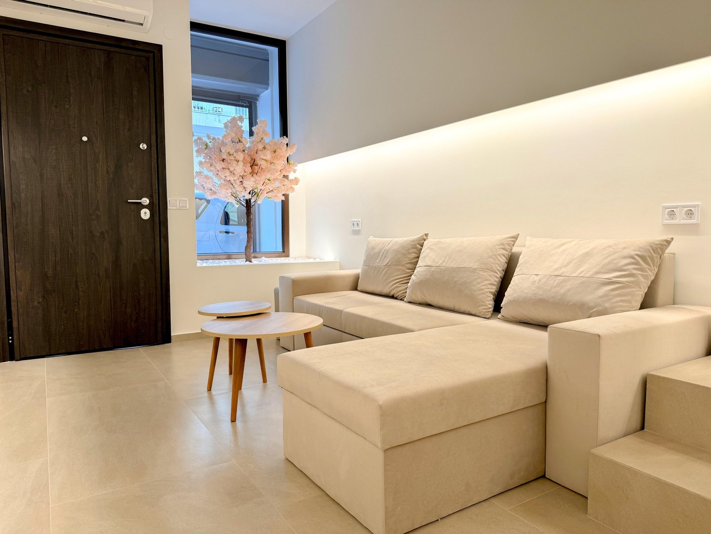Ground floor - Living room with Sofa bed and 58' 4K TV.