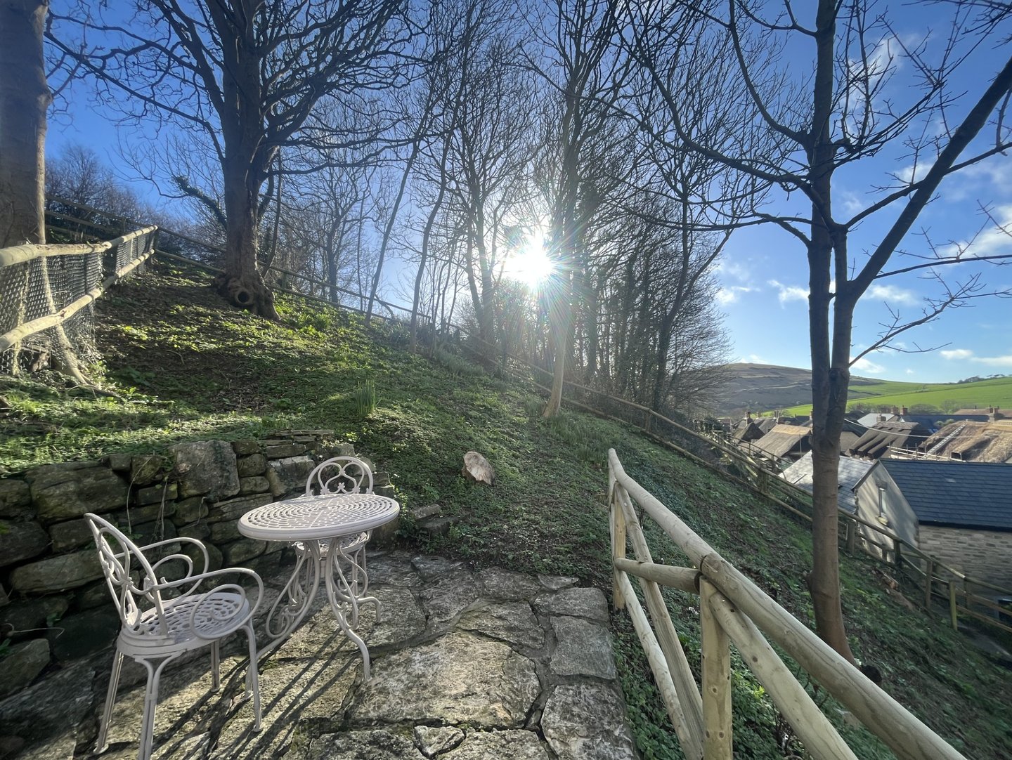 a garden from a holiday cottage overlooking west lulworth village