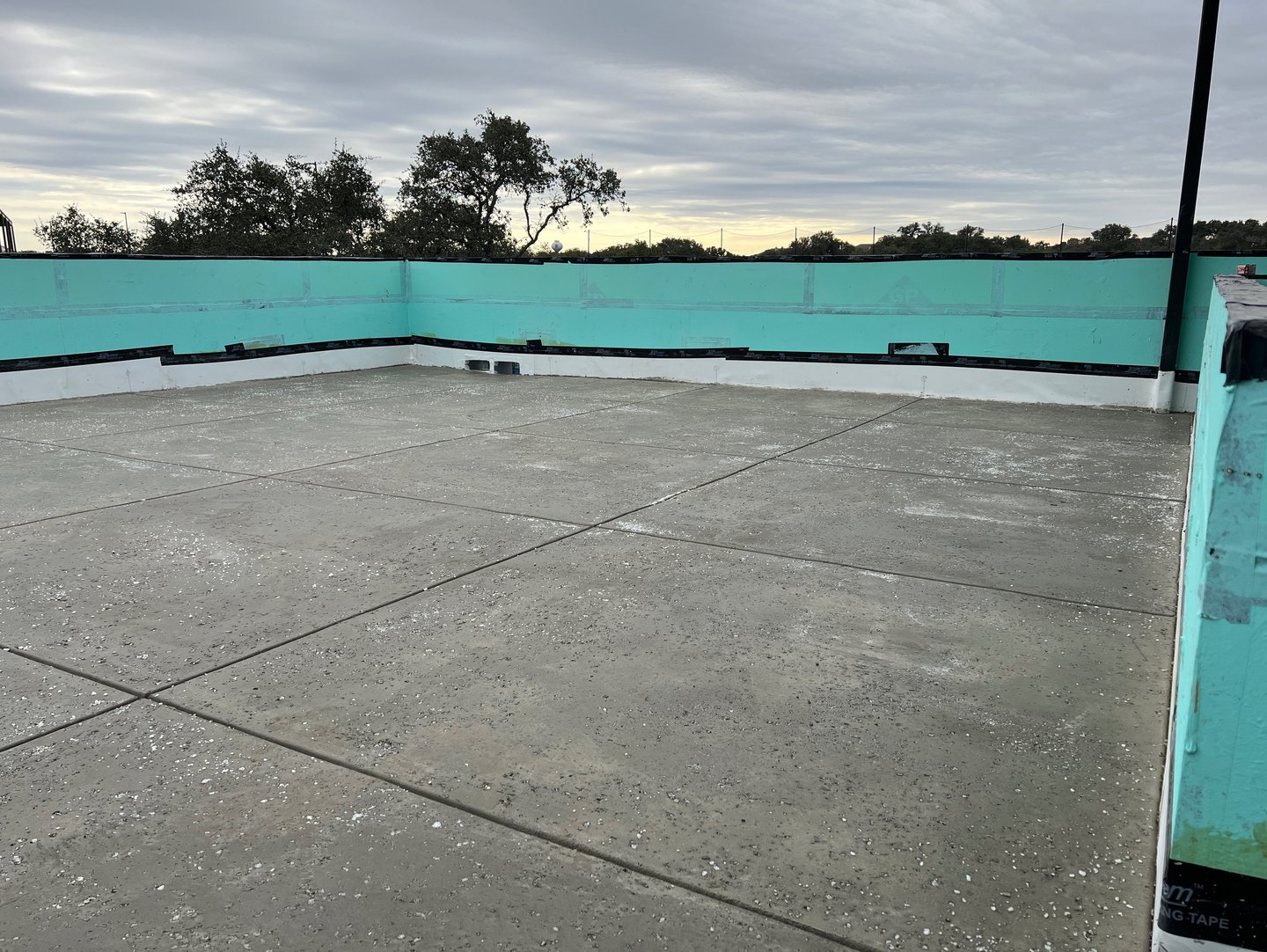 Roof tarrace poured with concrete and applied a salt finish. 