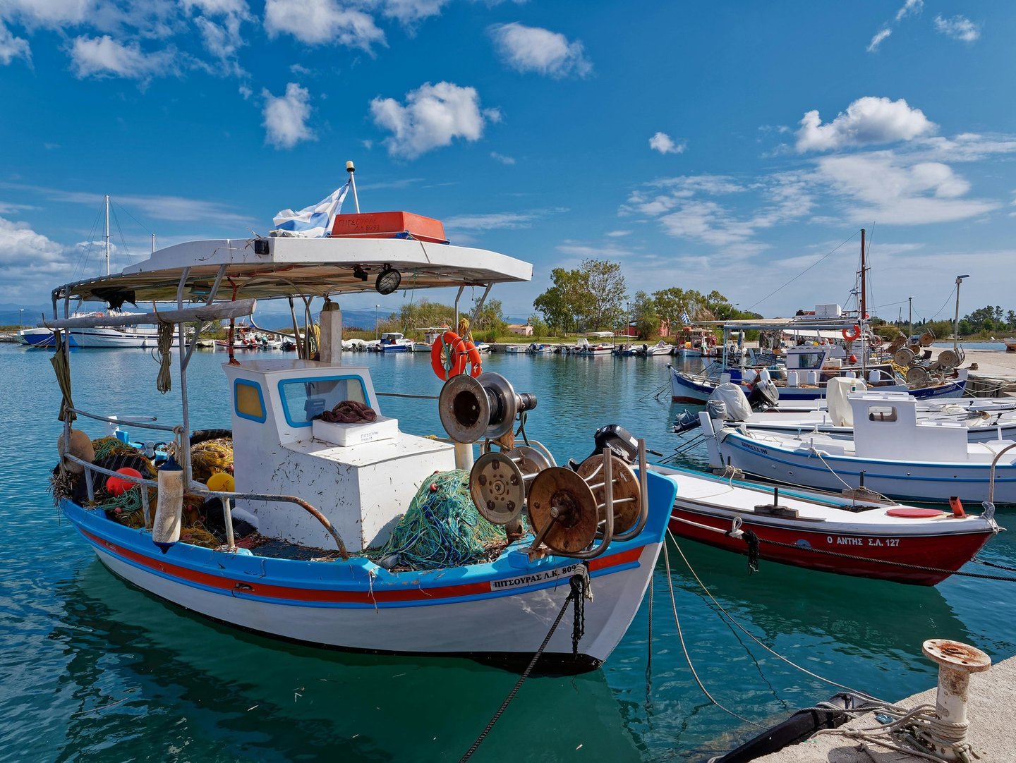 a boat with a boat in the water