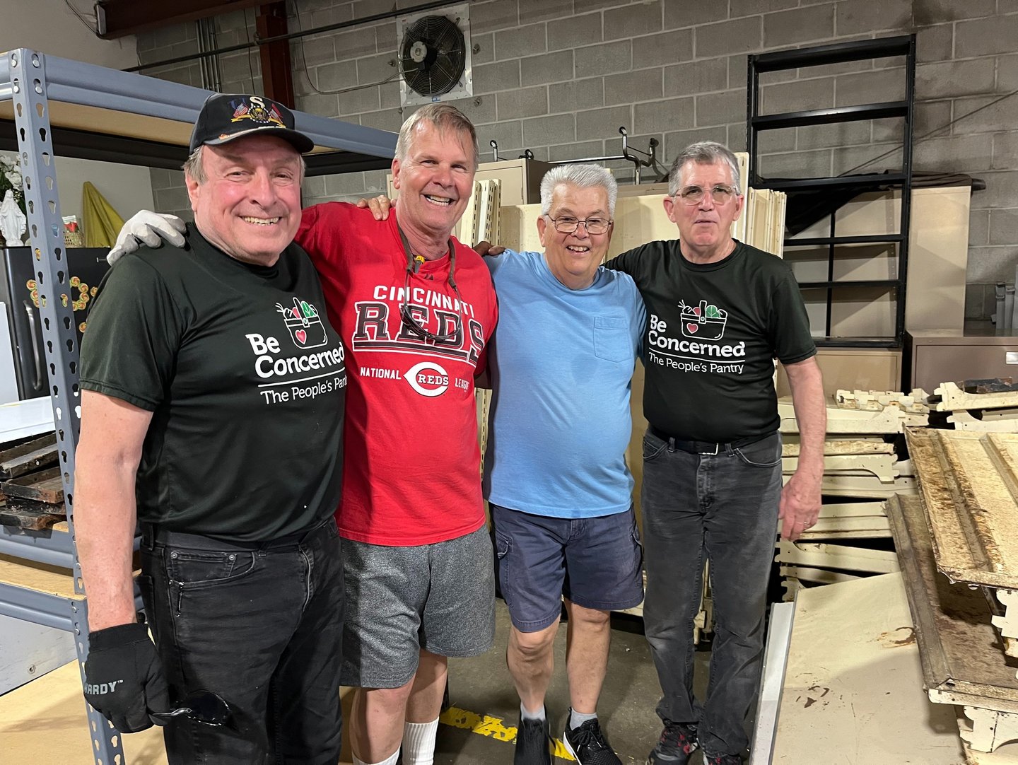 Rose Garden Volunteers working in the warehouse and enjoying each other's company.