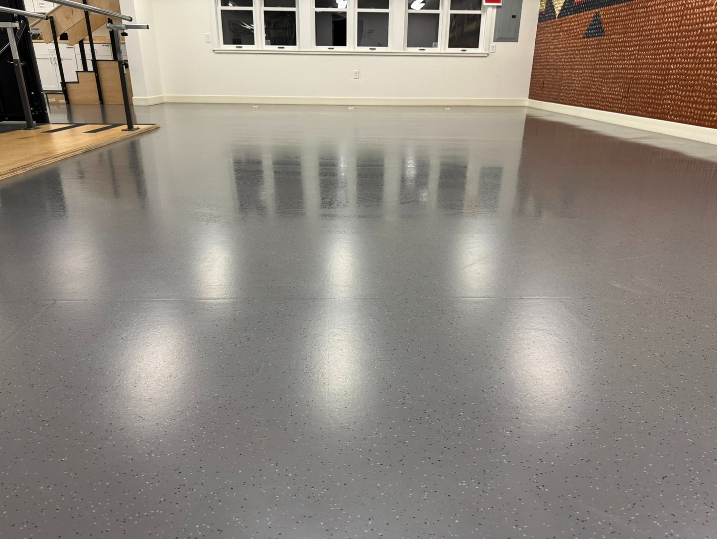 Shiny deep cleaned gym floor after being cleaned by Chez Cleaning Services
