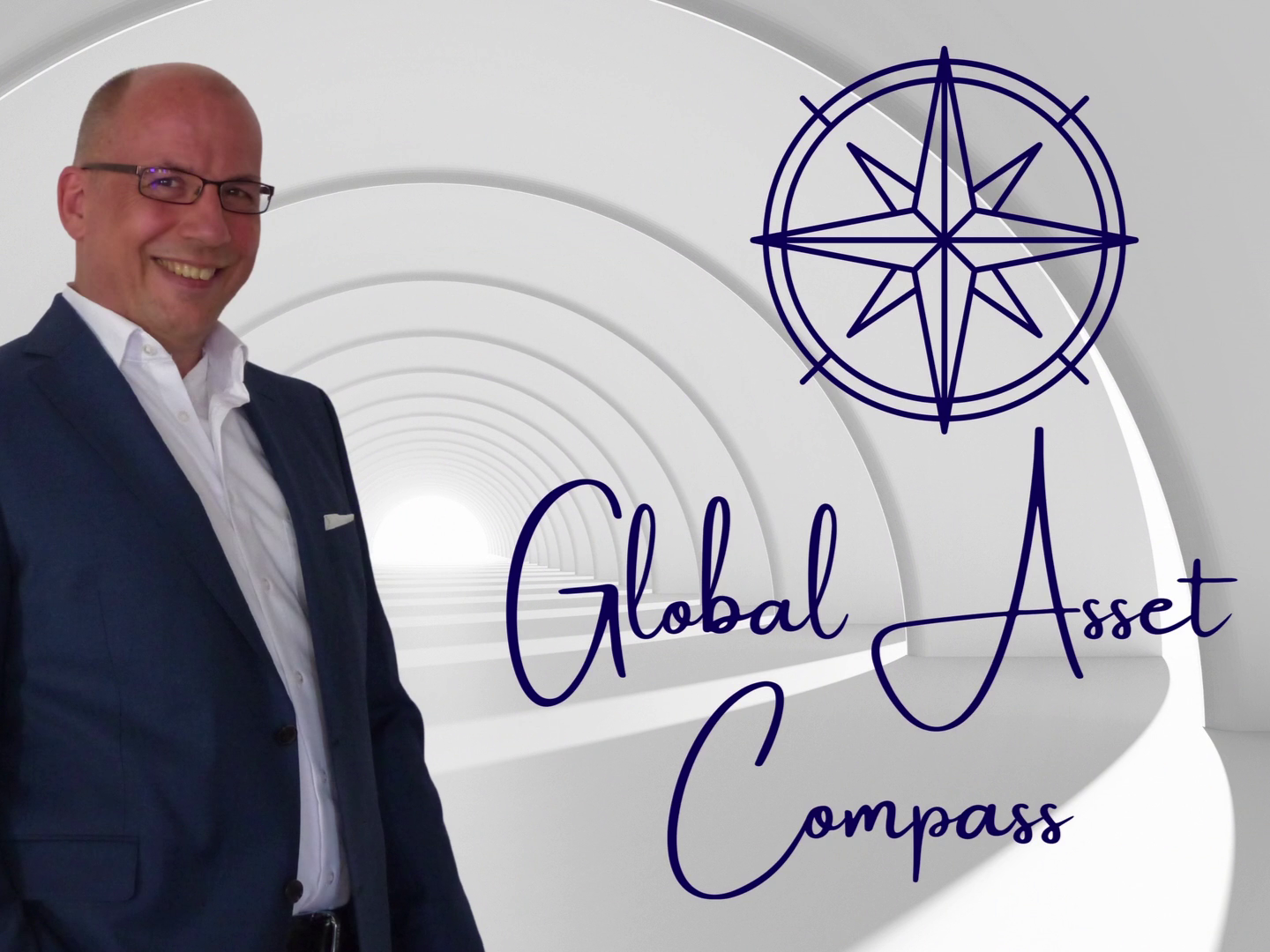 Professional Heinz Roelfs standing by Global Asset Compass logo and a white circular tunnel.