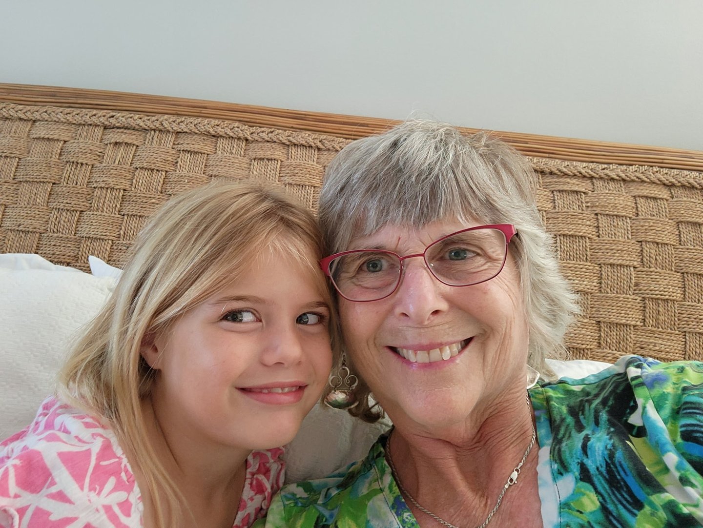 Teresa Wood-Hansen smiling next to her granddaughter Mary Grace 