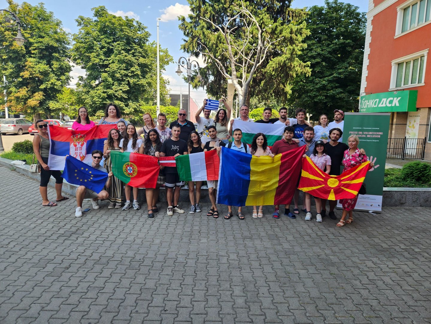 International youth exchange group with European flags Academy of Success