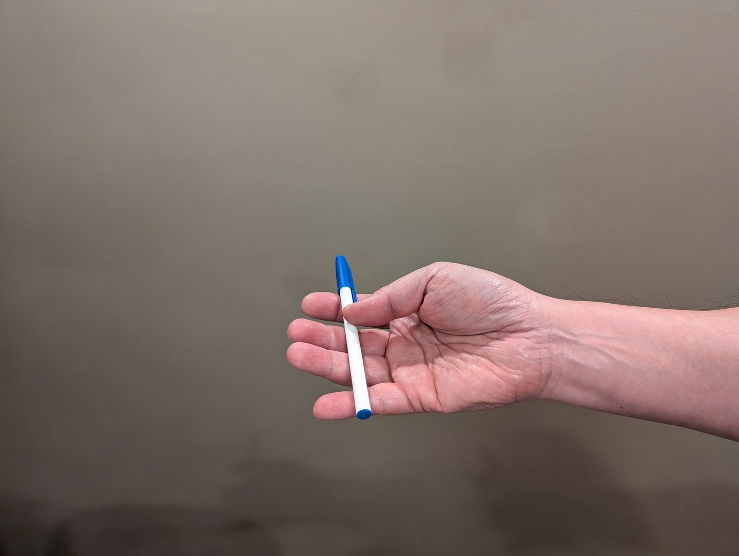 thumb near middle finger