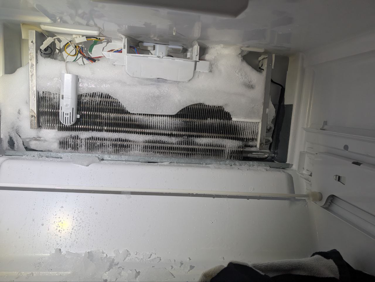 whirlpool refrigerator not cooling properly