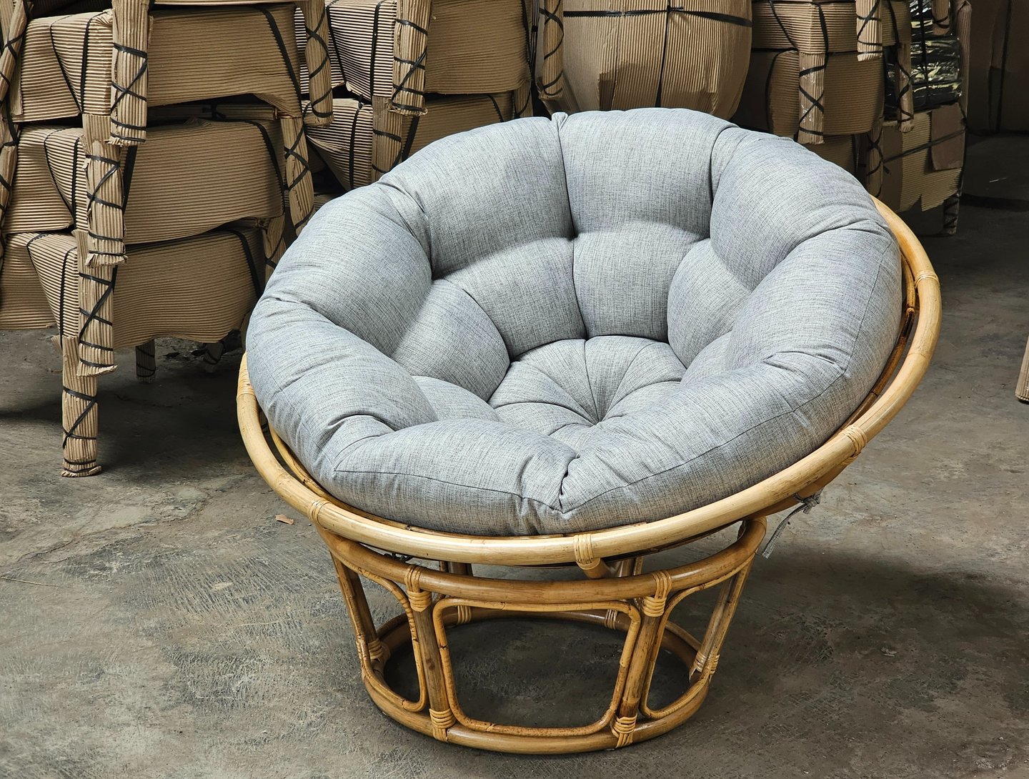 Papasan chair. Great for bulk orders because it's highly stackable, efficient in container.