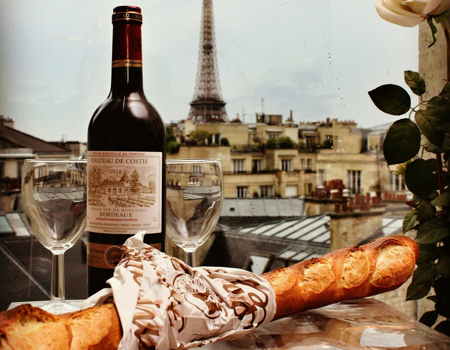 Wine bottles and glasses at Parisian wine bar