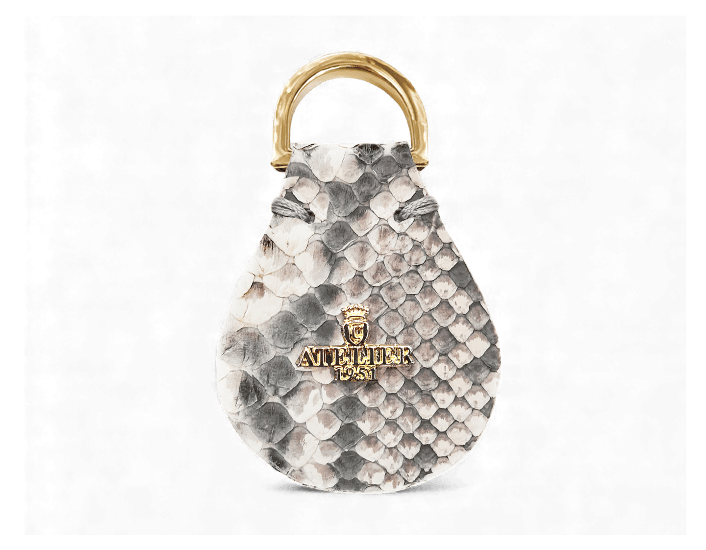 Luxury grey and white snakeskin leather keychain with gold Atelier 1951 logo and metal ring.
