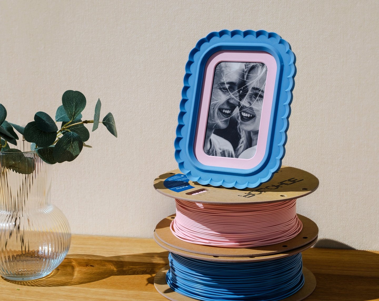     Home interior featuring KOIJOY frames and 3D printing elements like filament spool