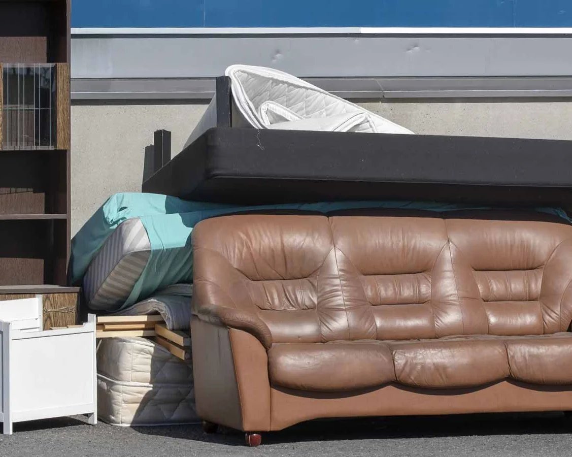 Old Sofa and Mattresses in Trash