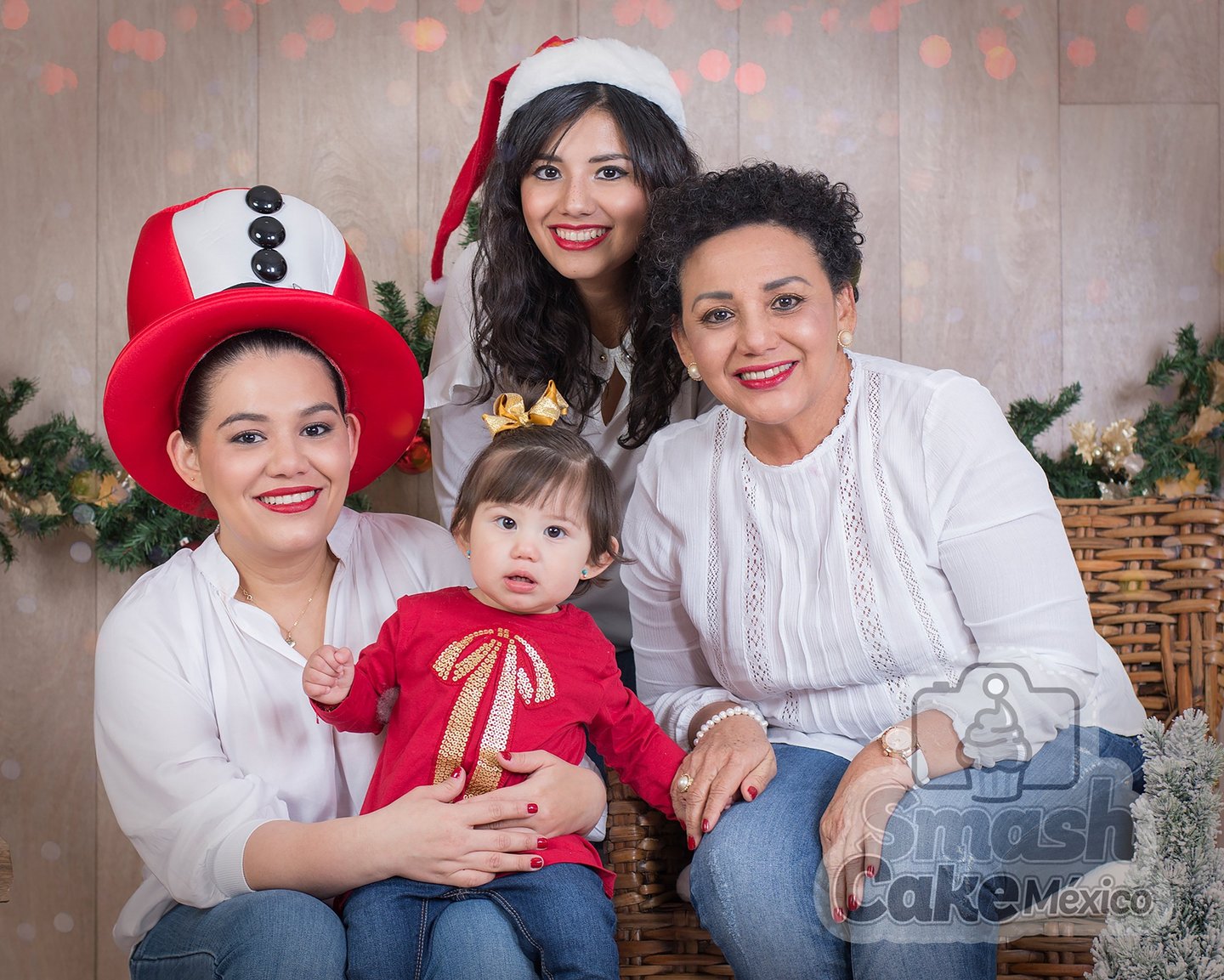 a family posing for a photo with a christmas tree