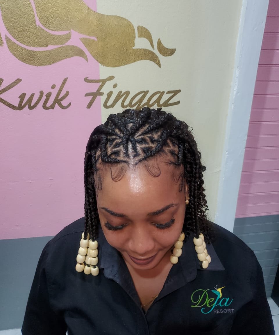 Client rocking a chic blend of cornrows with beads and a sleek sew-in for a versatile look by Kwik Fingaz Beauty Salon.
