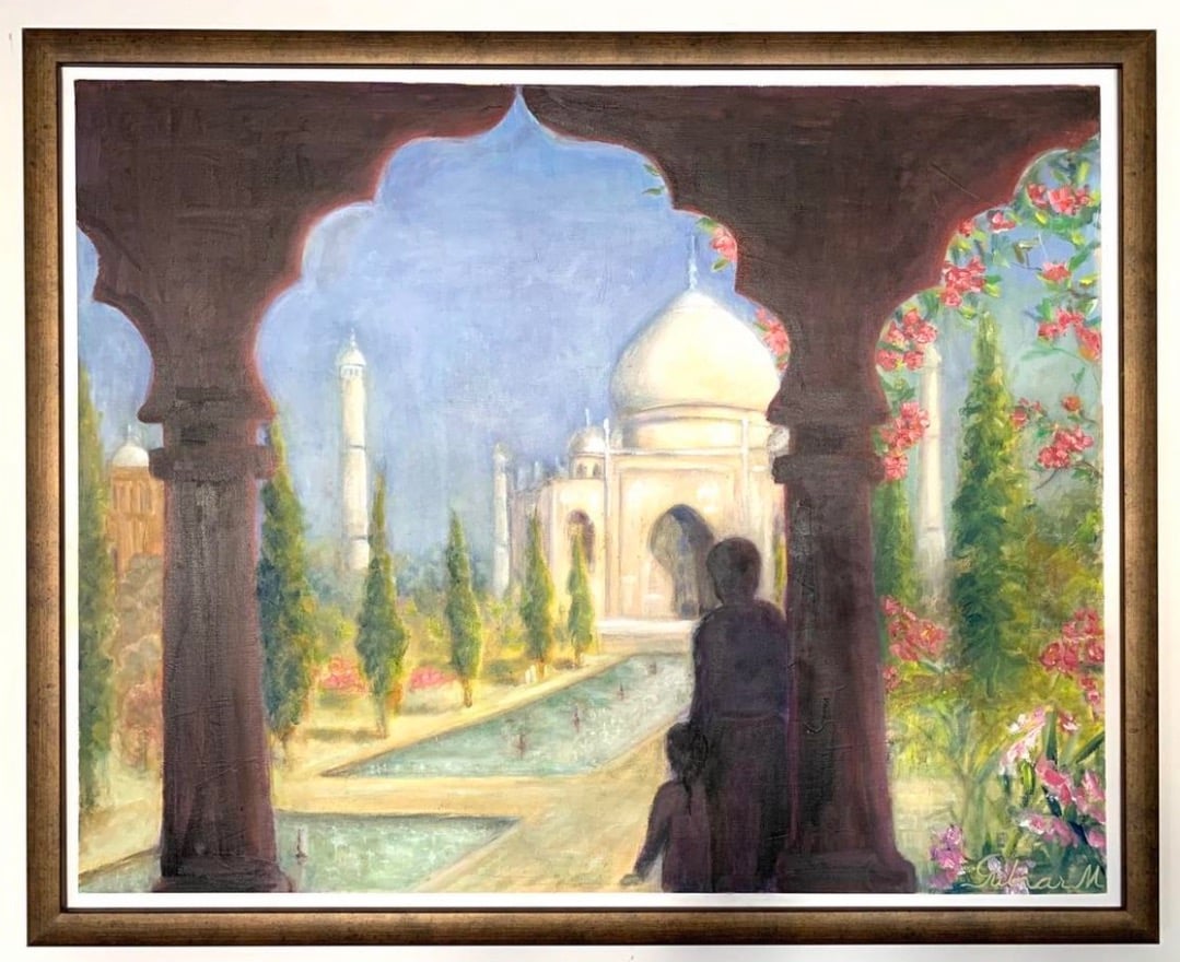 Father and child admiring Taj Mahal view