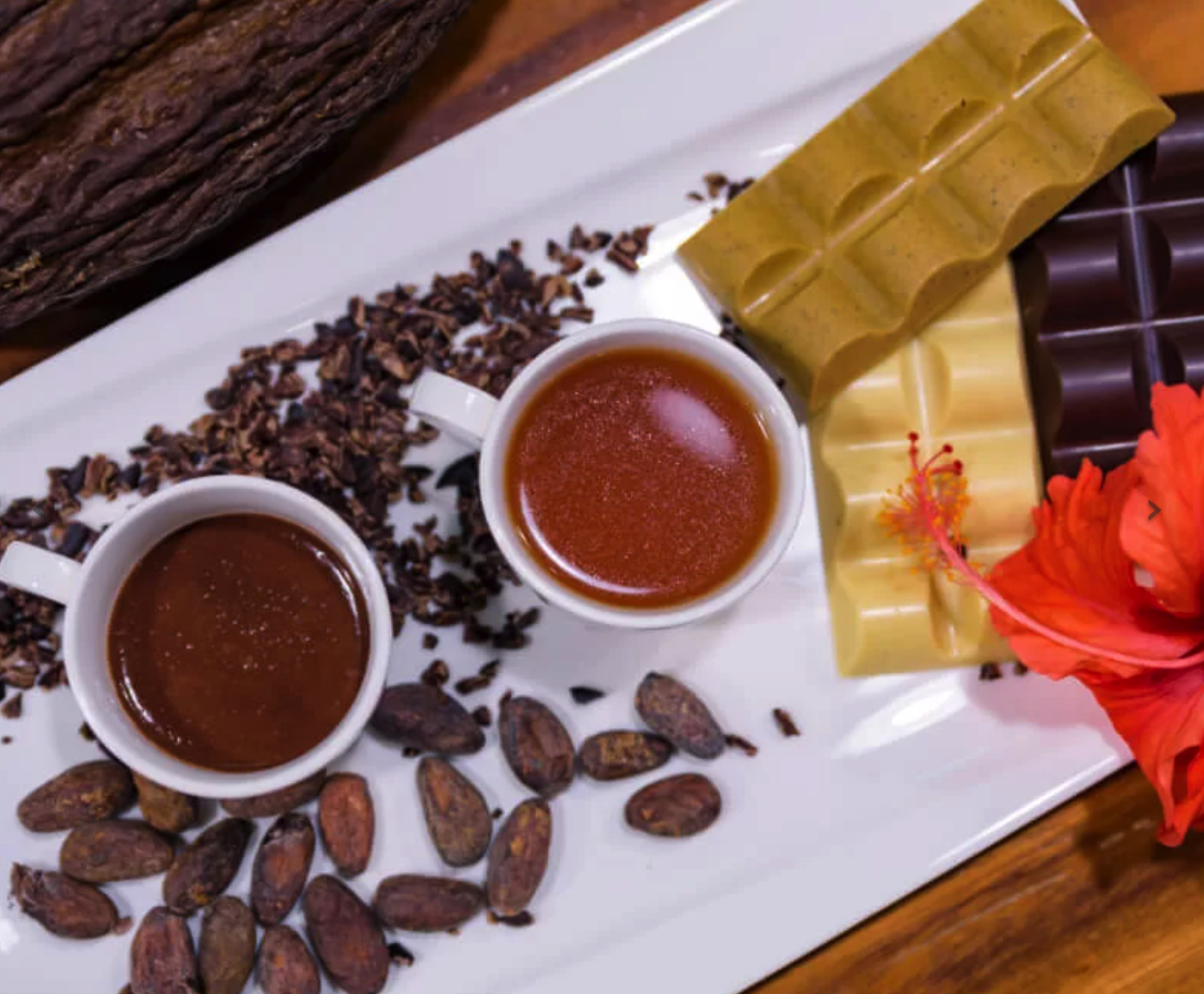 small cups filled with sipping chocolates in a variety of flavors