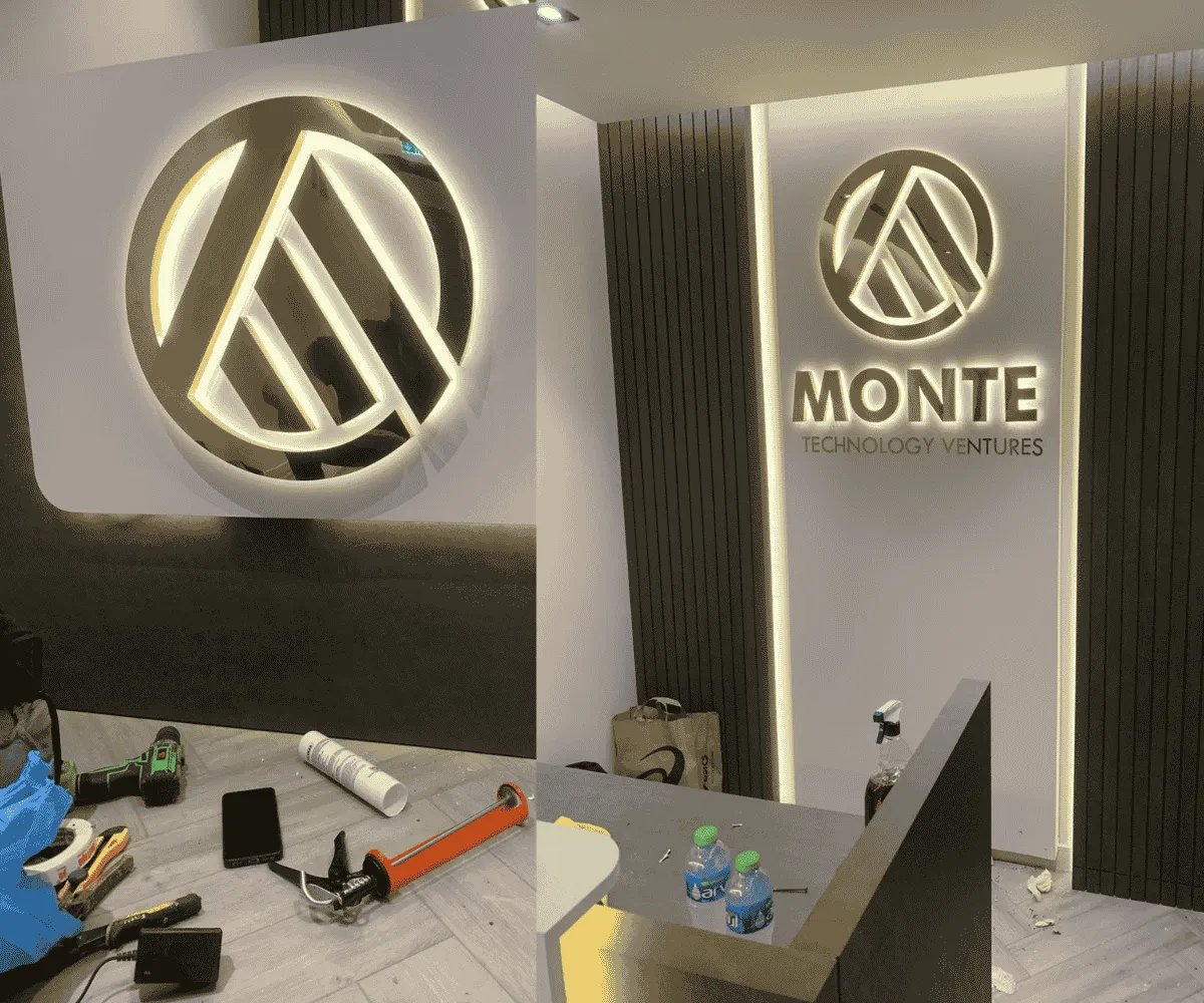 Monte Technologies 3D gold stainless steel brushed finish back lite sign install on their reception
