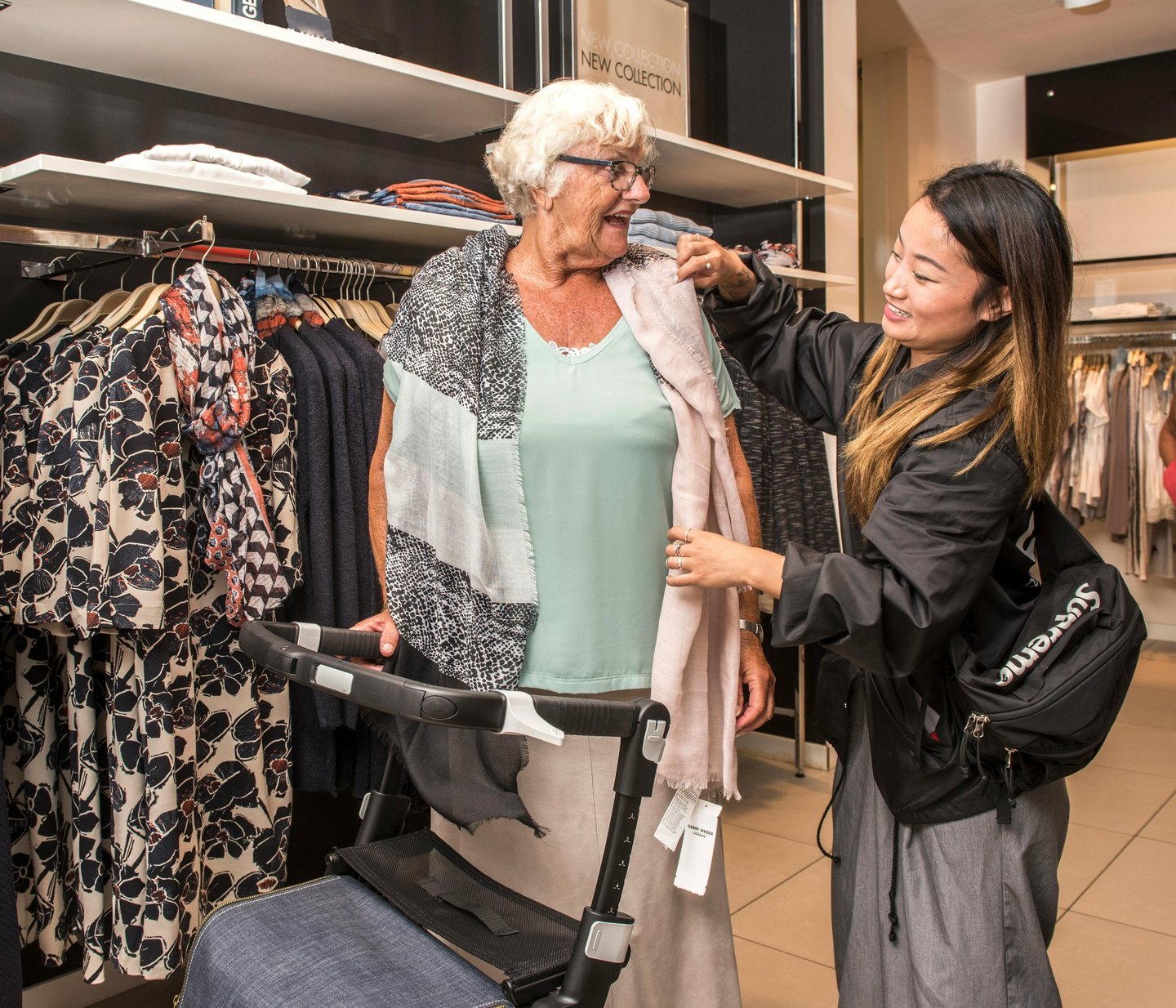 an elderly woman in a dress shirt and a stroller