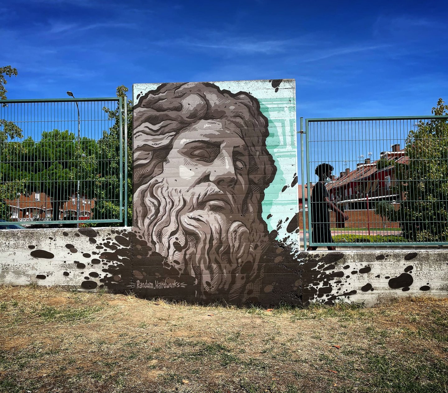 Mural de zeus en un evento de graffiti.